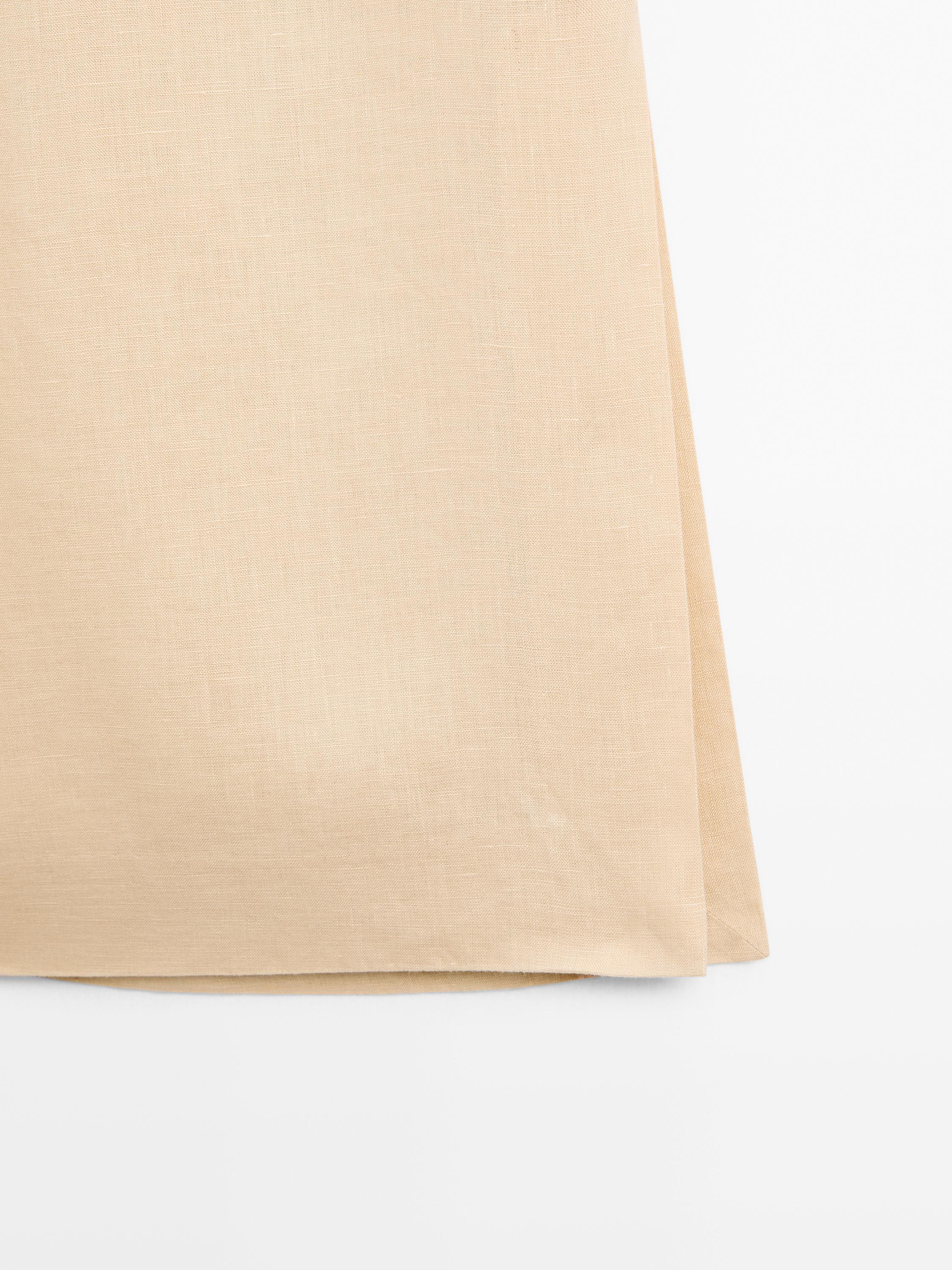 Flowing 100% linen trousers with elastic detail
