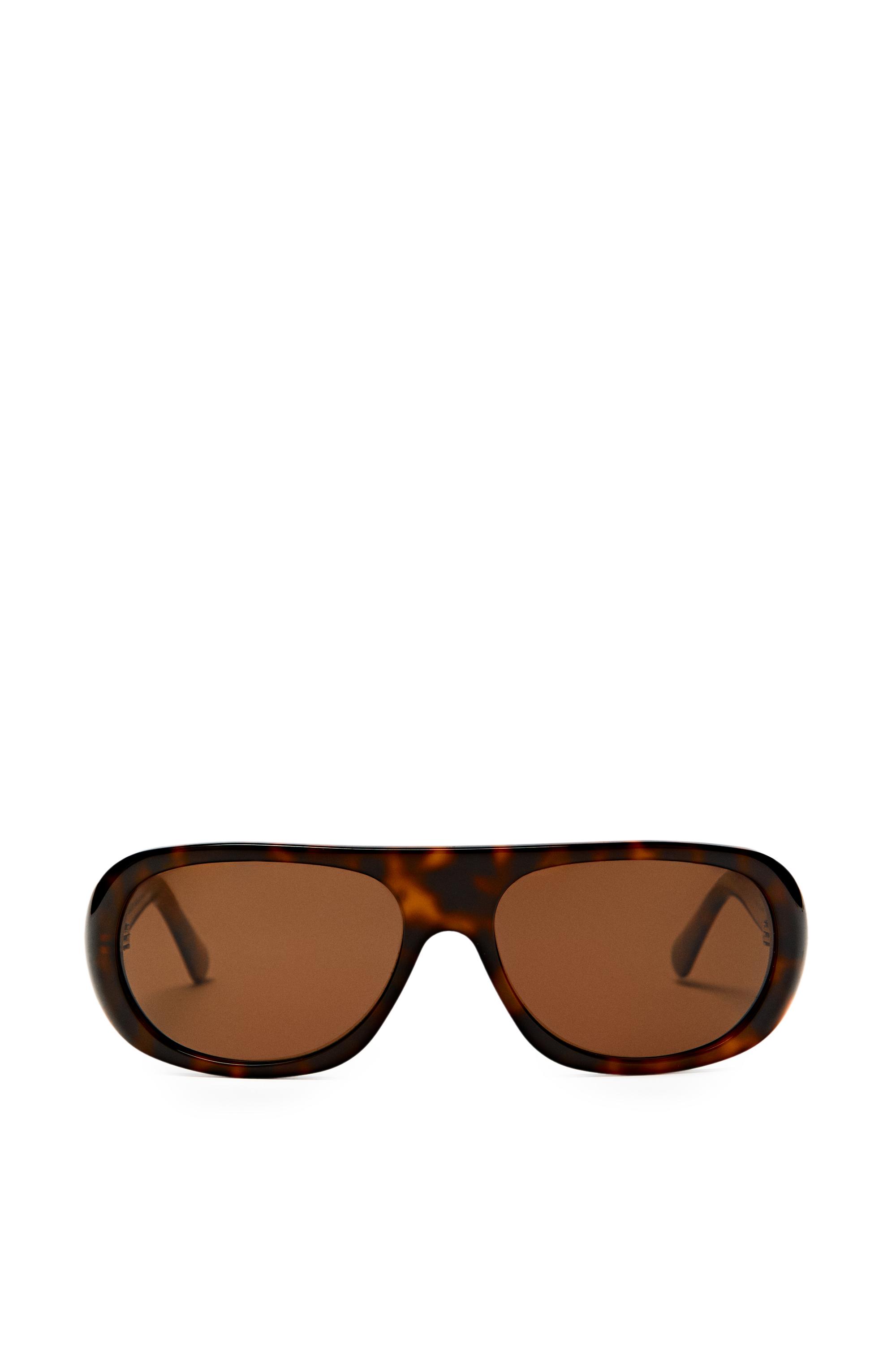 Oval tortoiseshell-effect sunglasses — BROWN