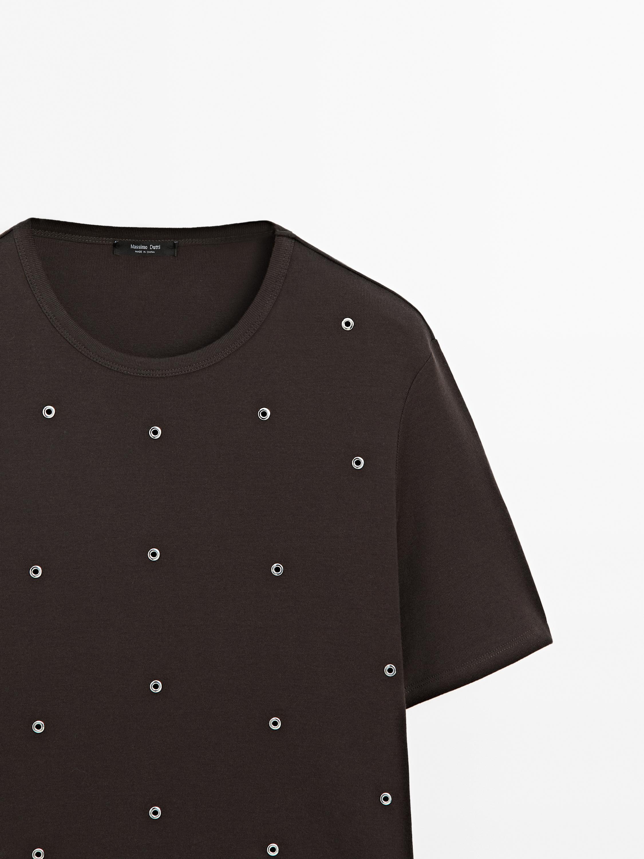 Oversized T-shirt with eyelets