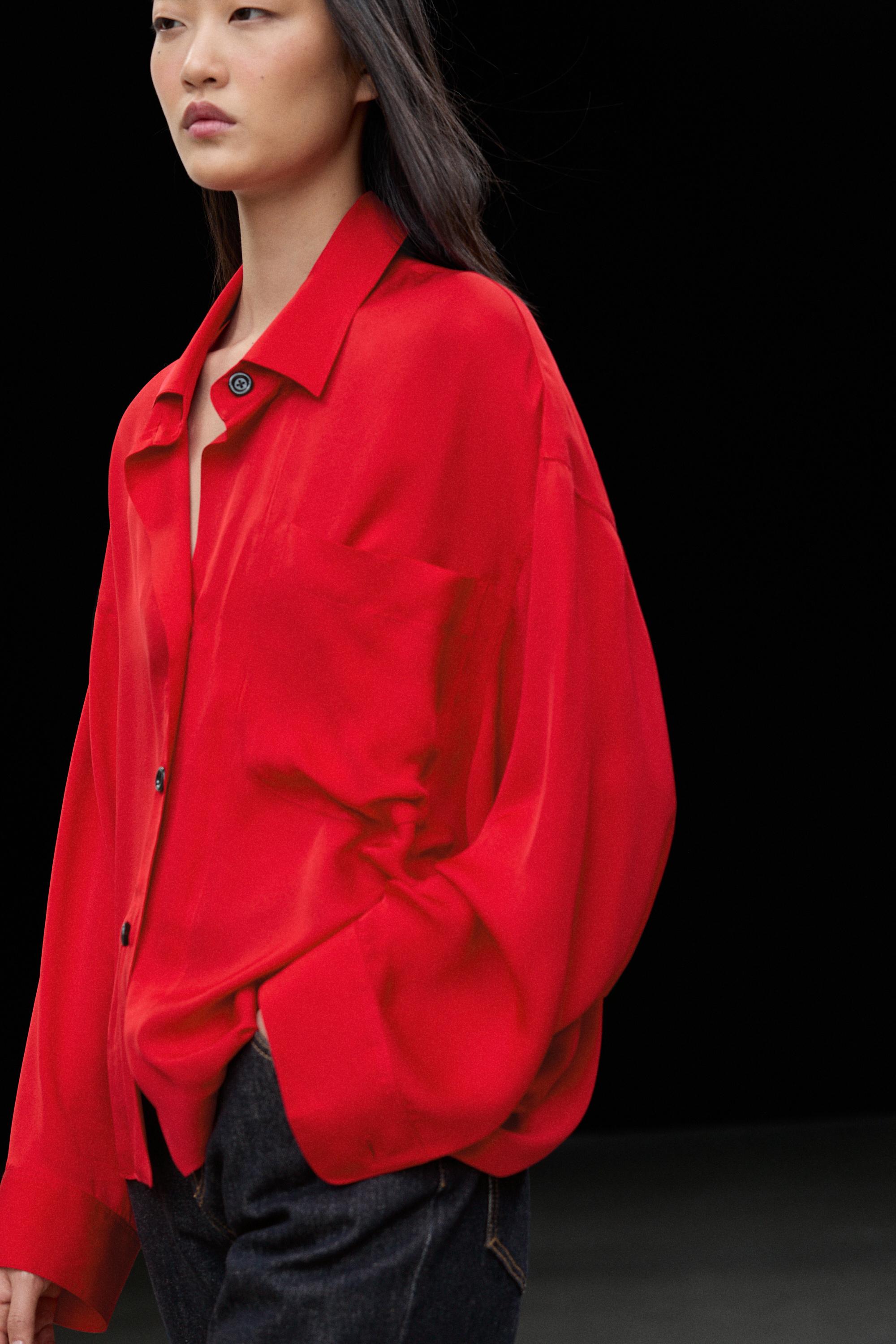 Camisa fluida oversize detalle bolsillo