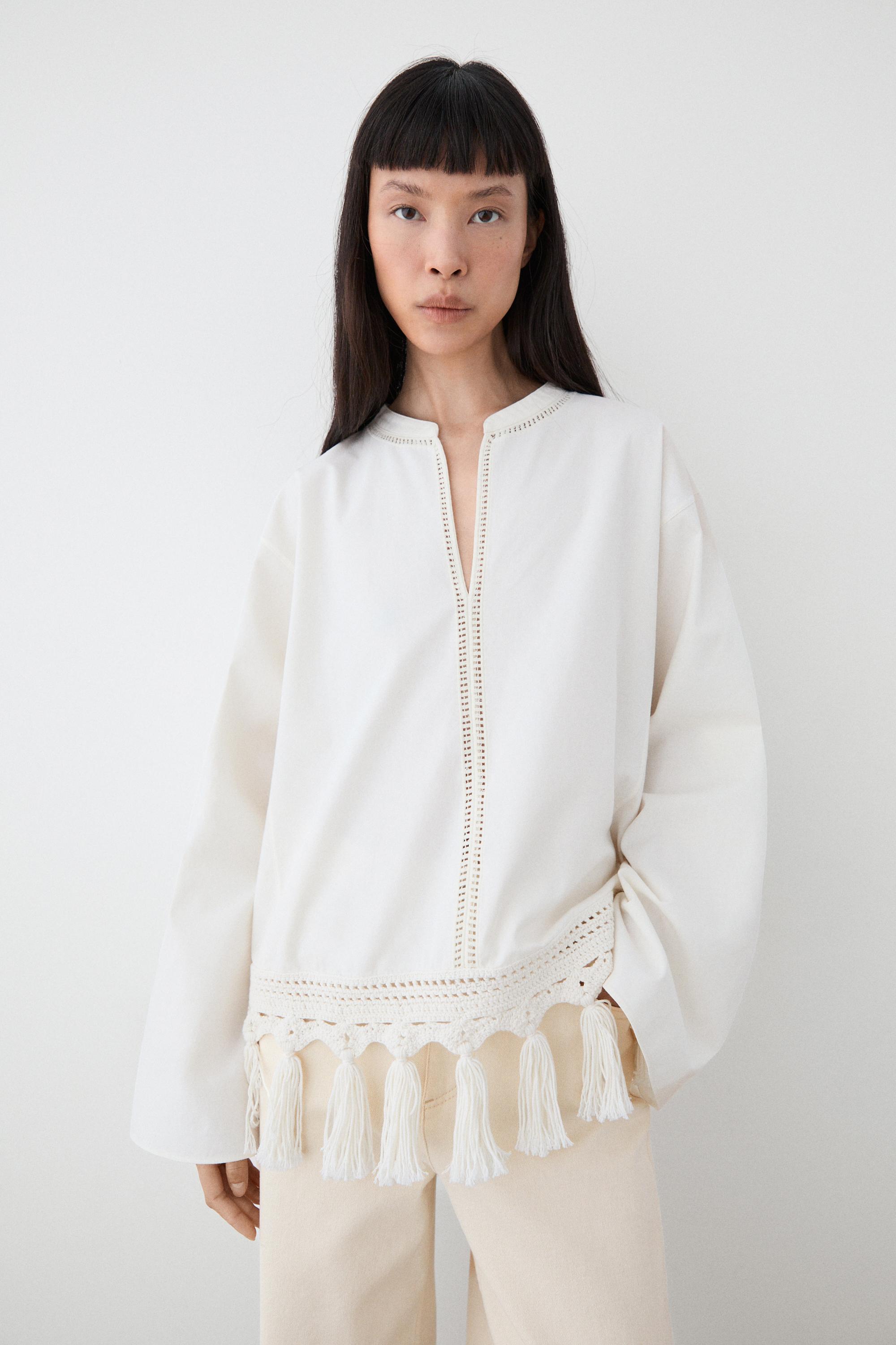 Embroidered blouse with fringed hem — WHITE