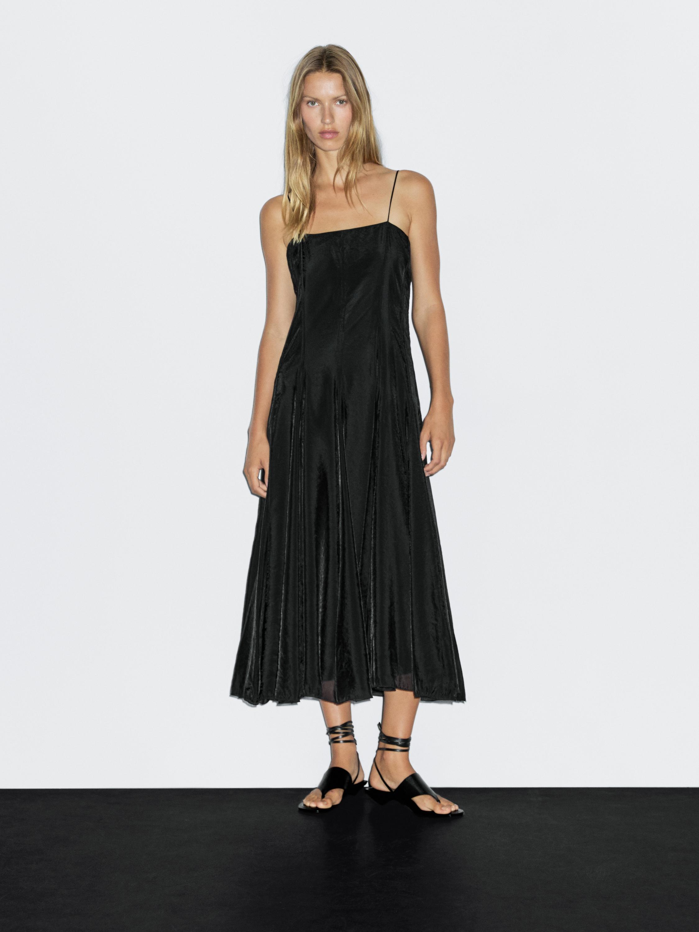 Vestido midi fluido detalle godets