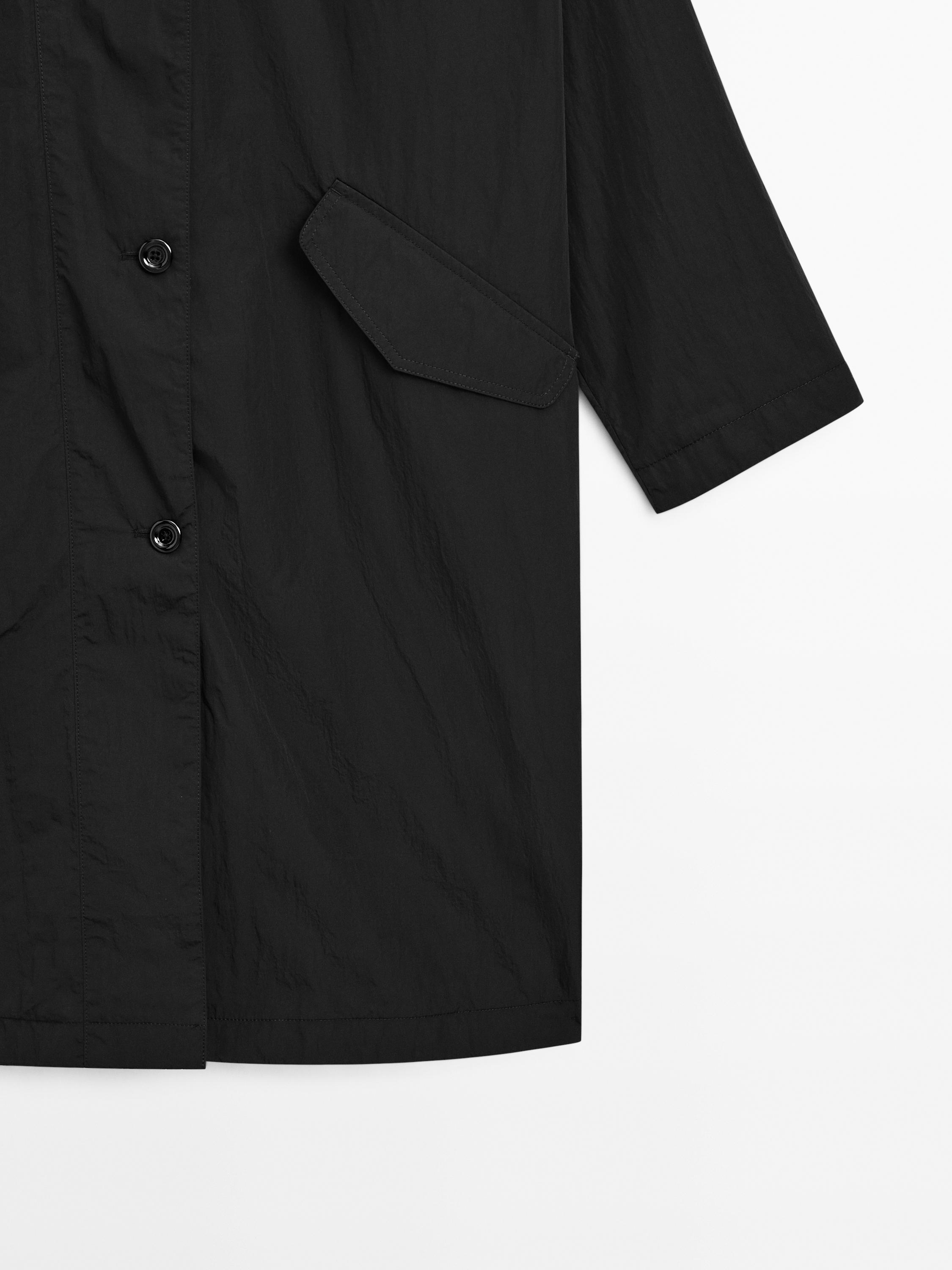 Oversize flowing trench coat in water-repellent fabric
