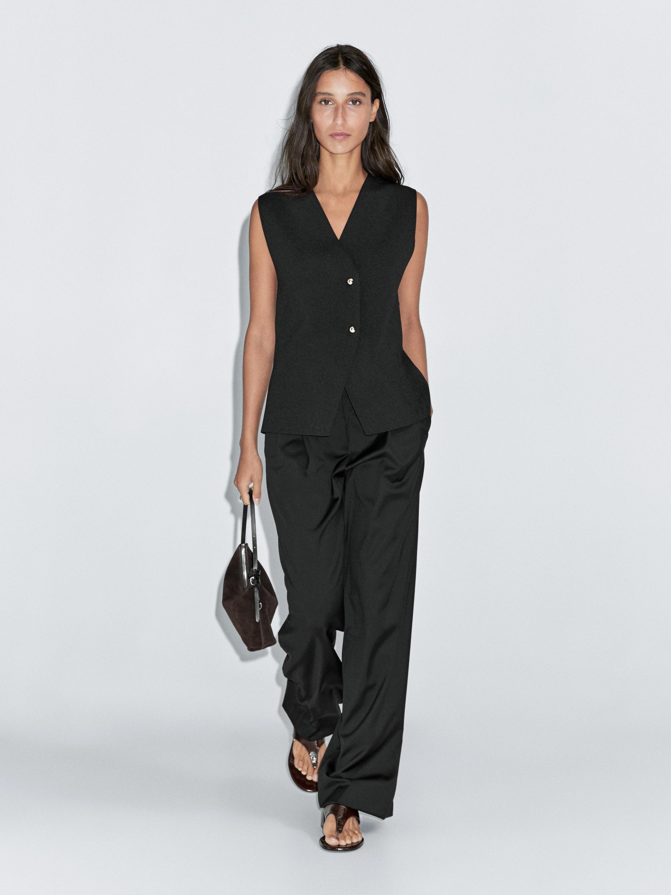 Chaleco punto cuello pico