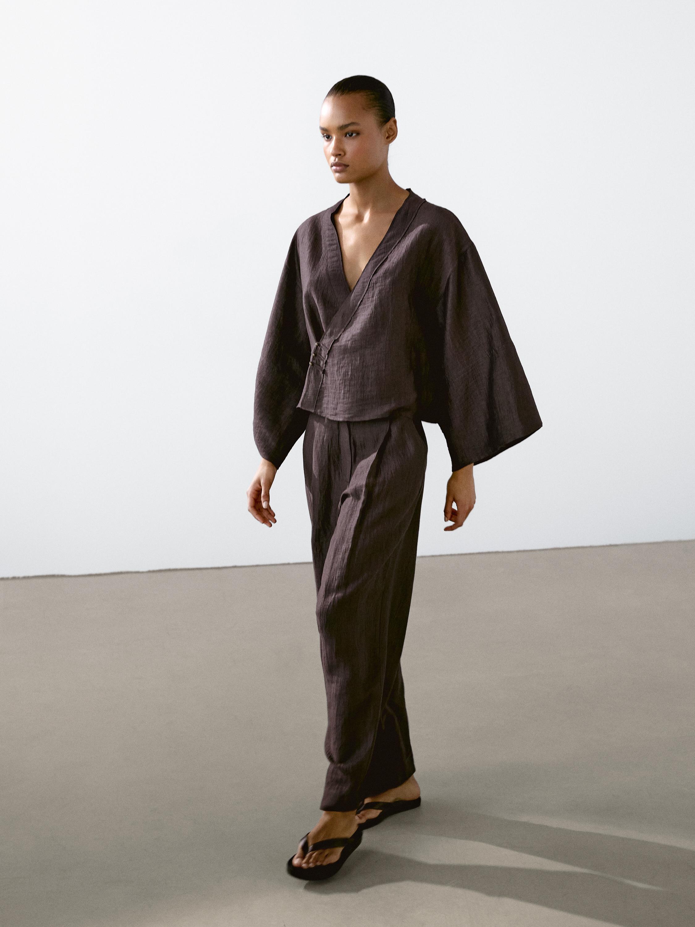 Flowing linen blend trousers with darts