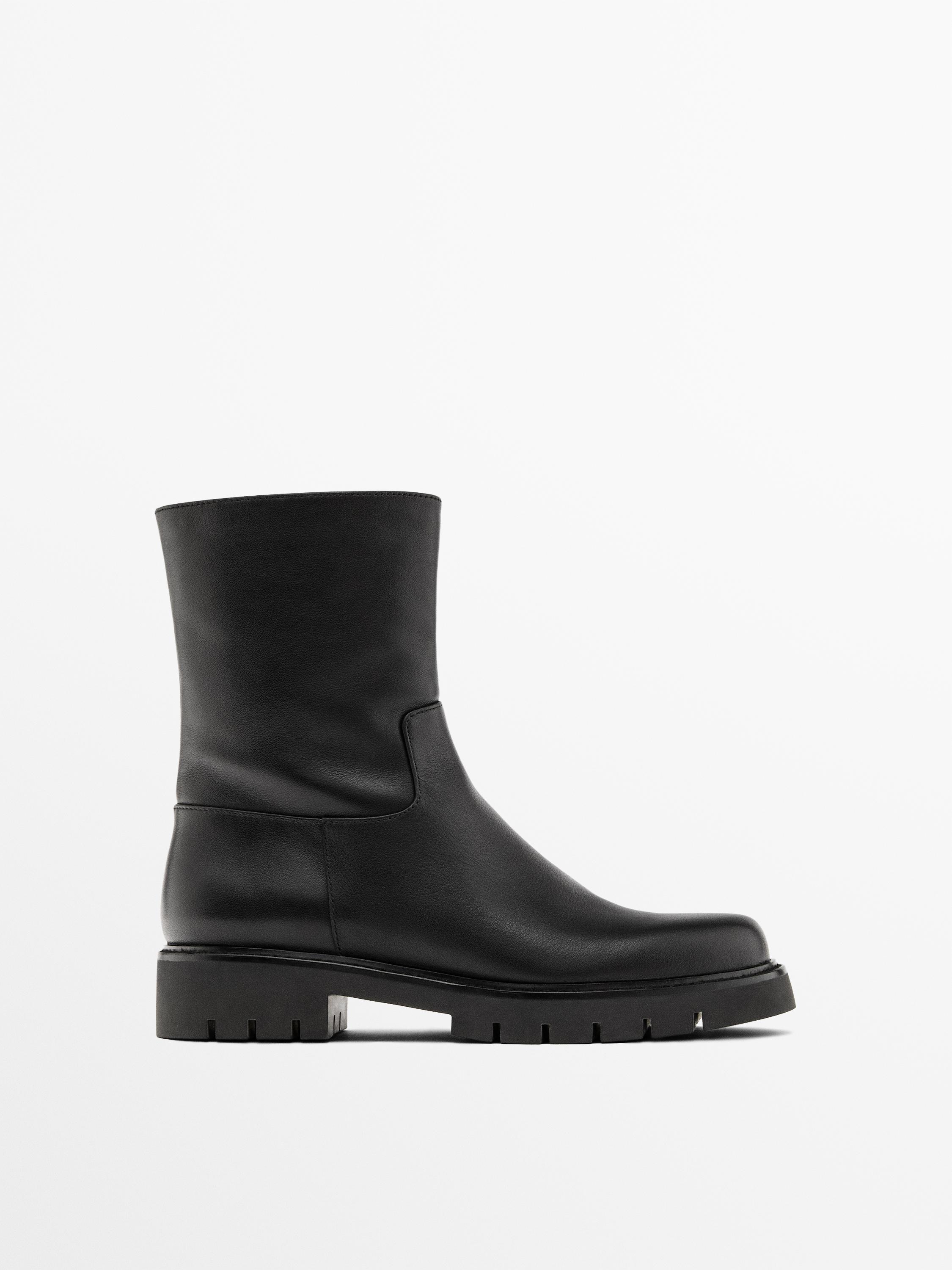 Track sole flat ankle boots