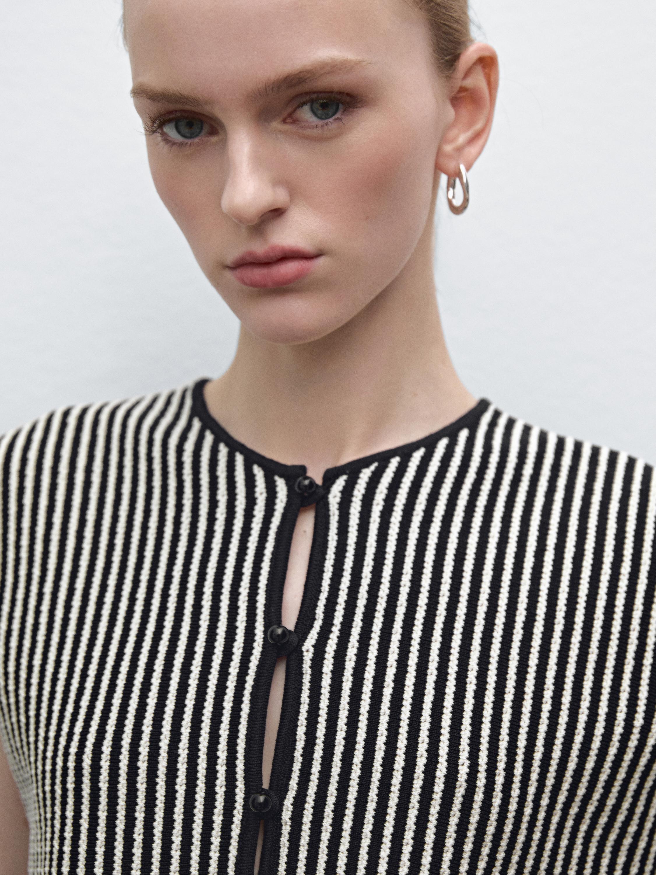 Veste sans manches cropped en maille à rayures