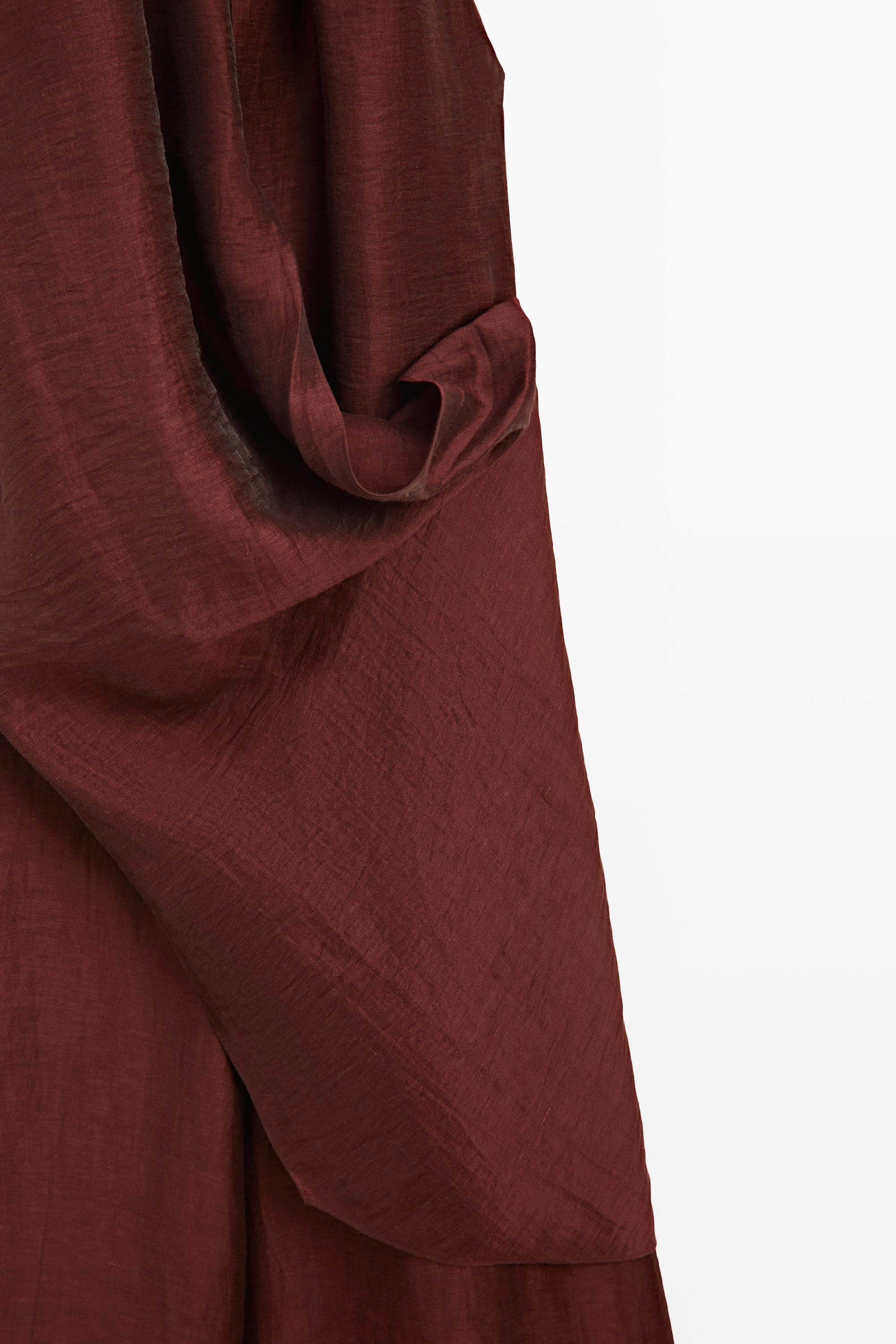 Flowing draped halter neck jumpsuit — BURGUNDY
