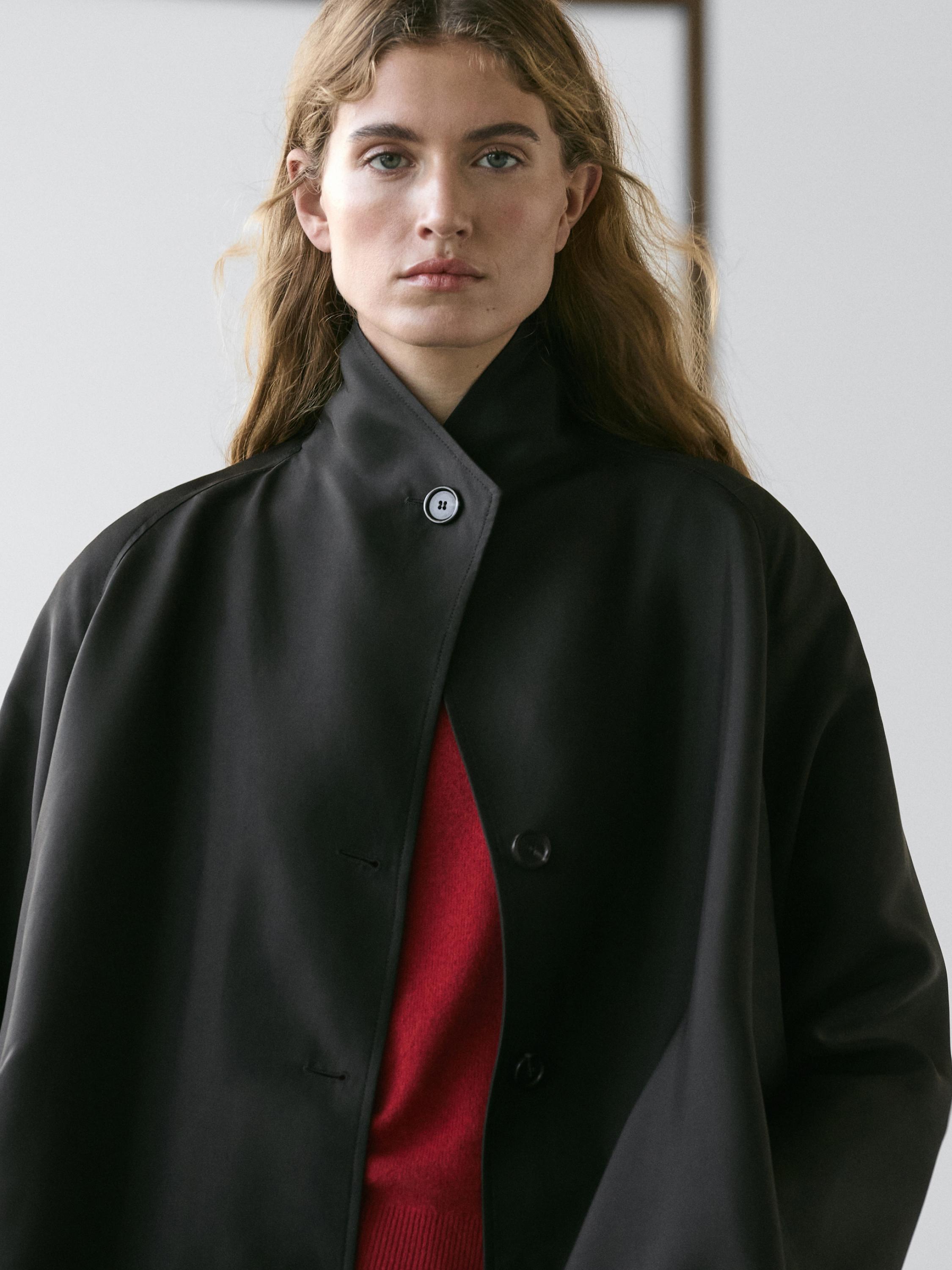 Flowing voluminous cape with button details — BLACK