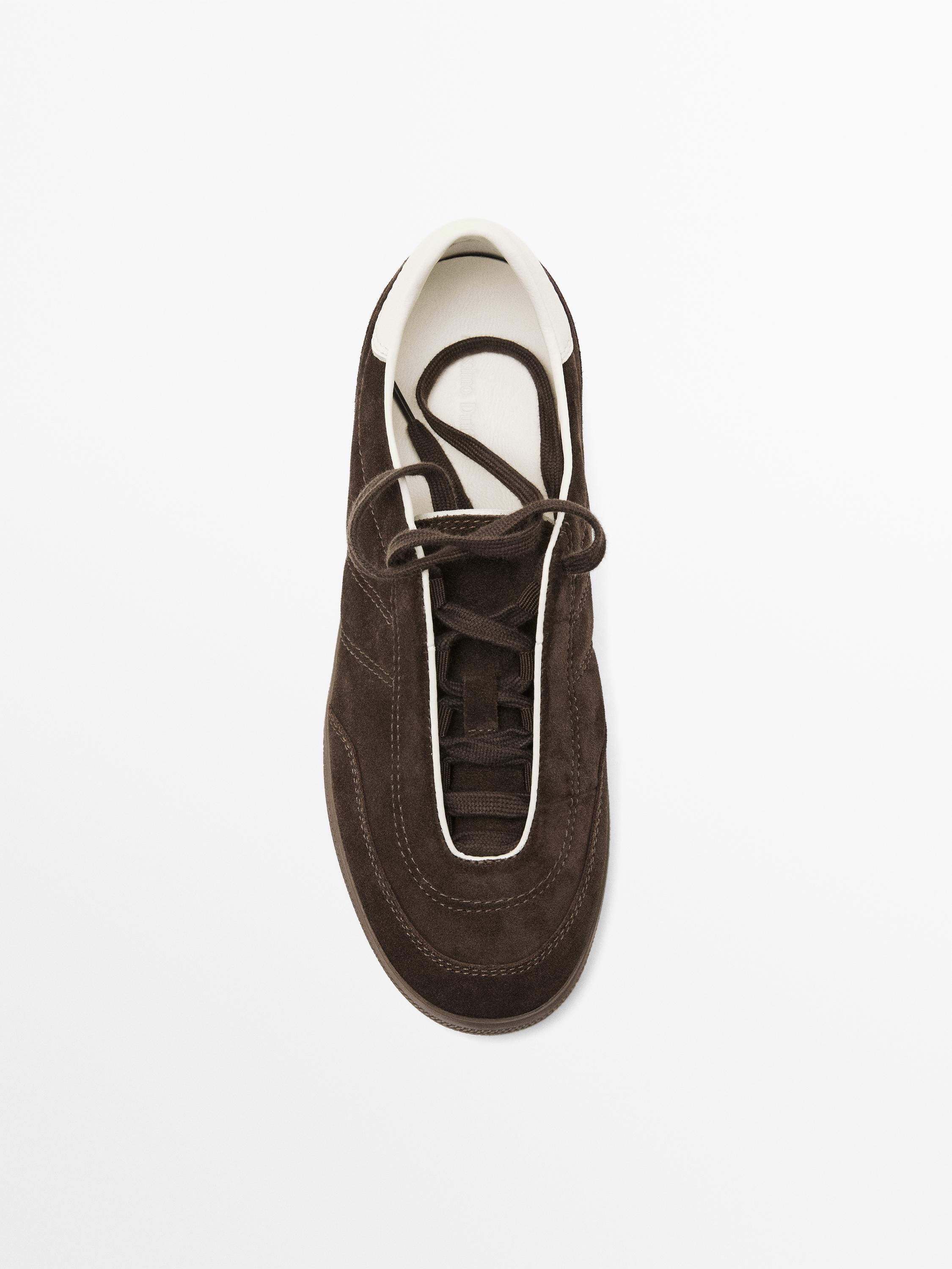 Split suede trainers with topstitching