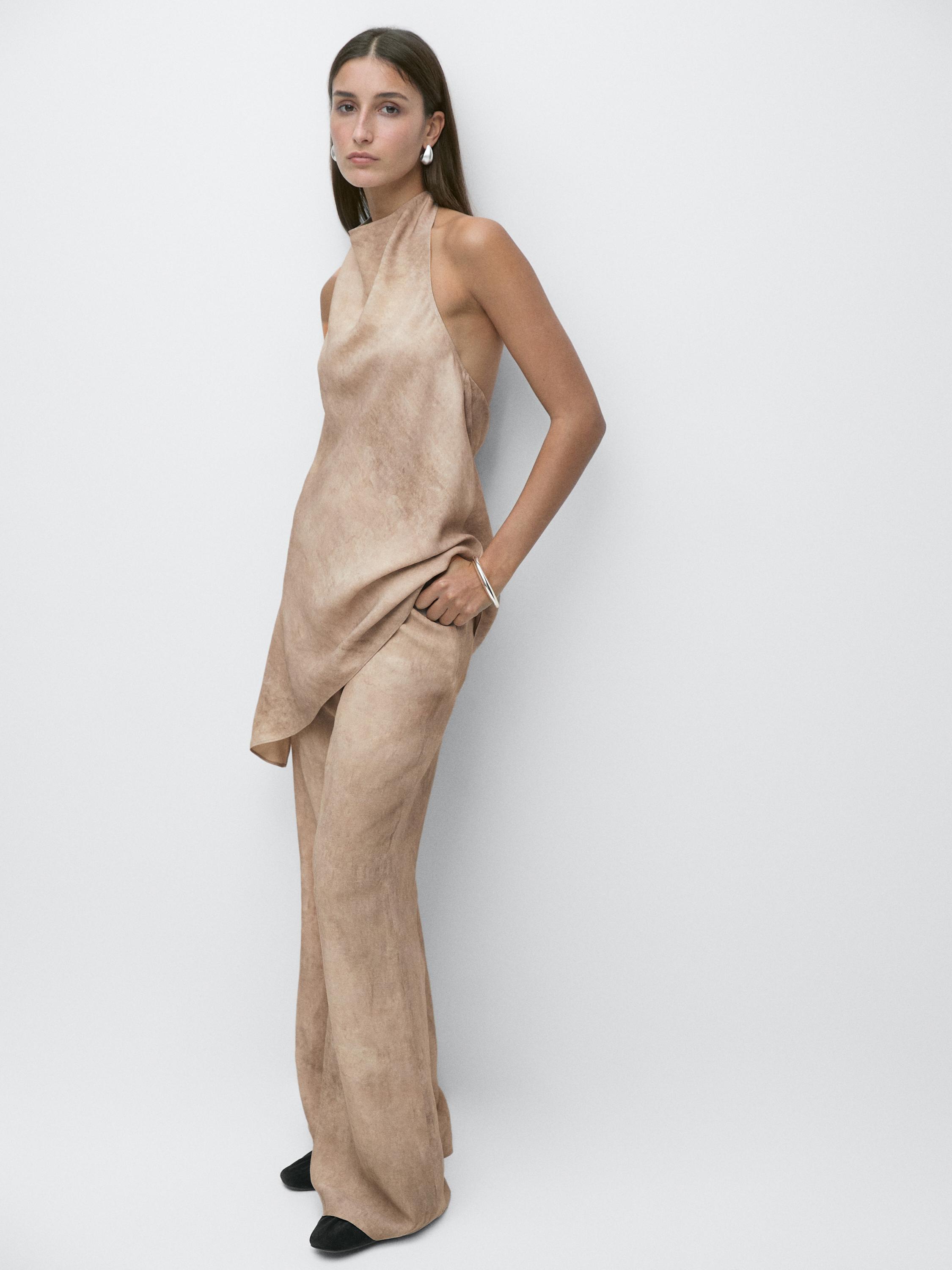 Distressed-effect flowing trousers — STONE