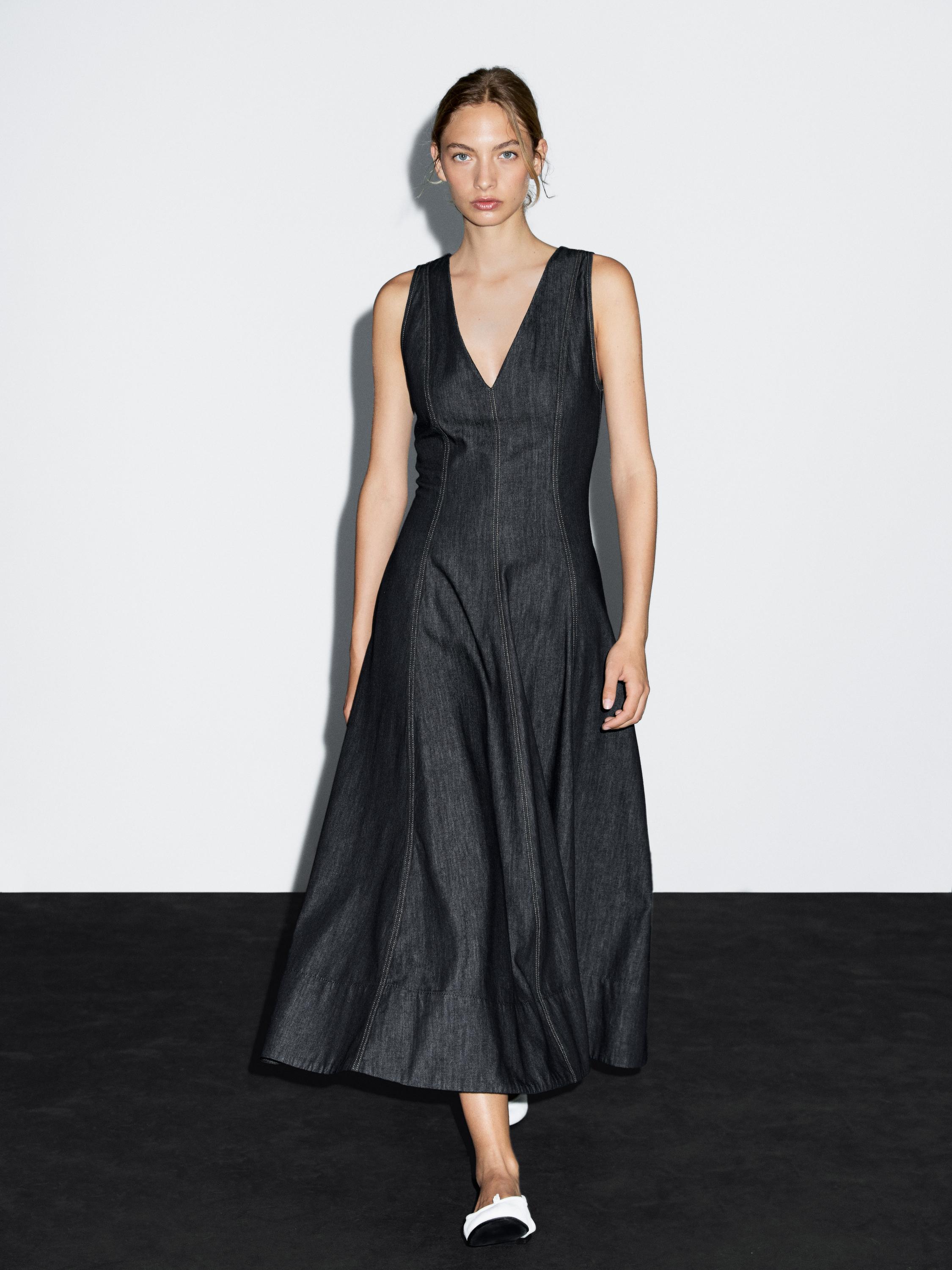 فستان ميدي دنيم بتفاصيل بالغرزة