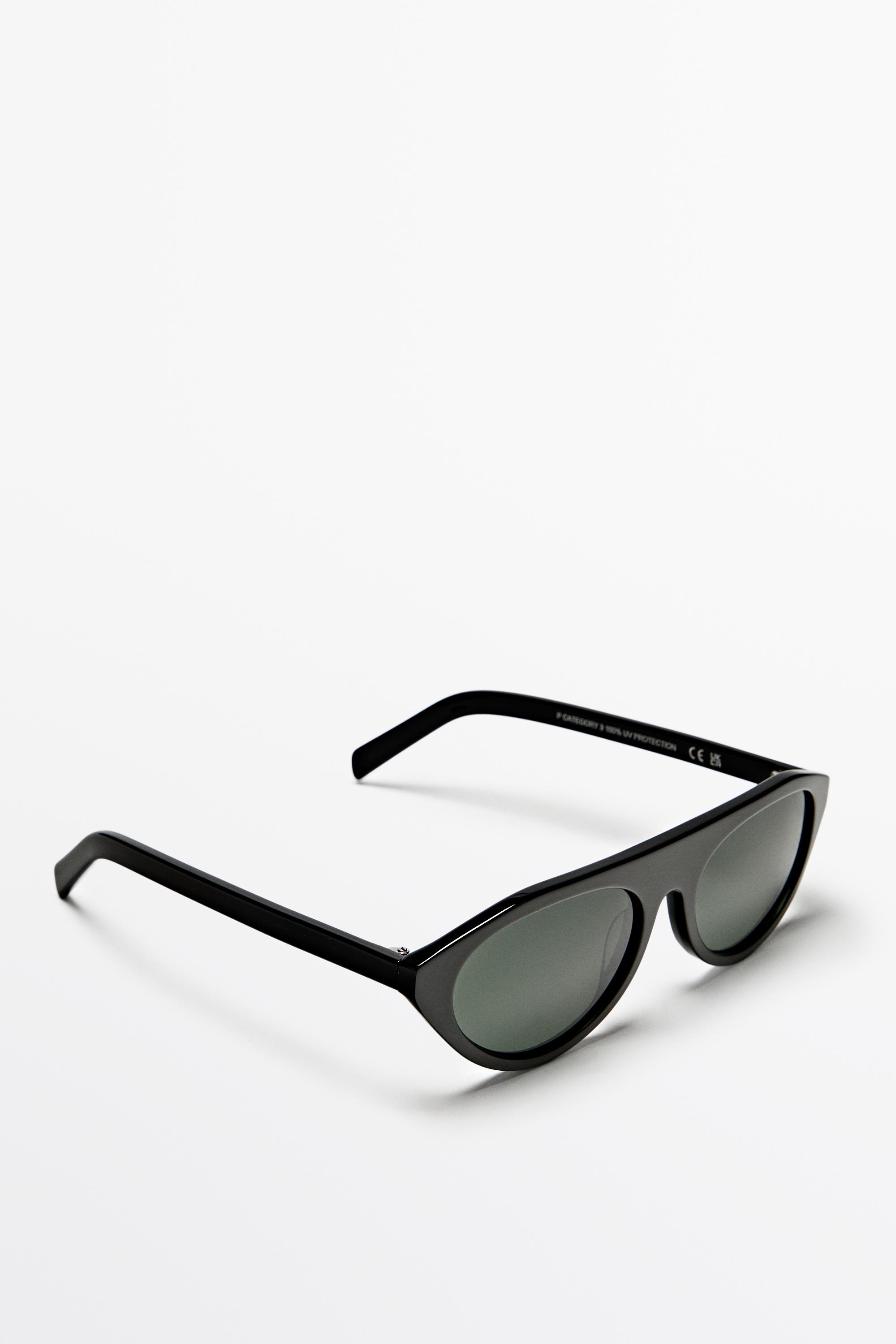 Oval sunglasses — BLACK