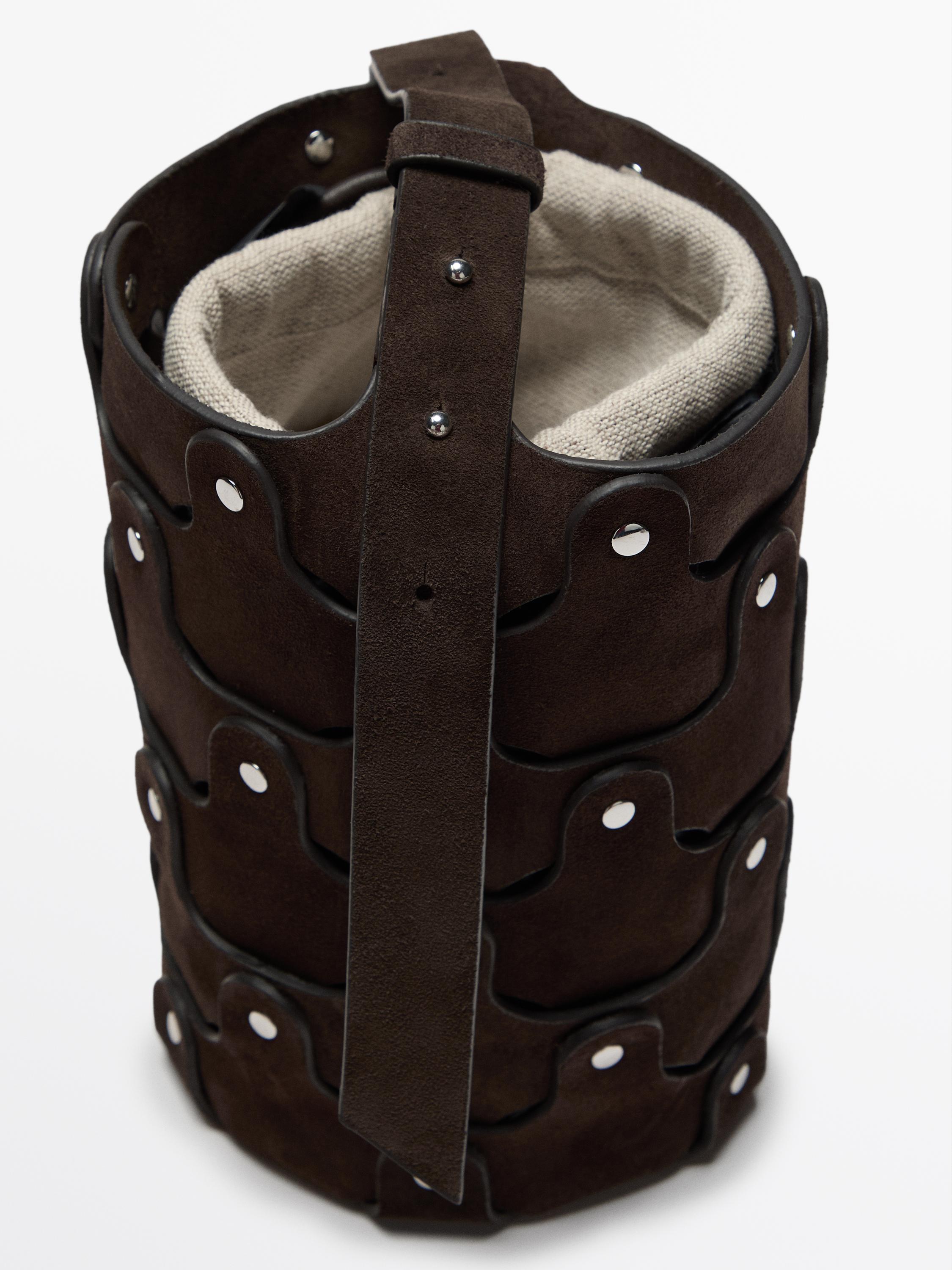 Studded split suede bucket bag