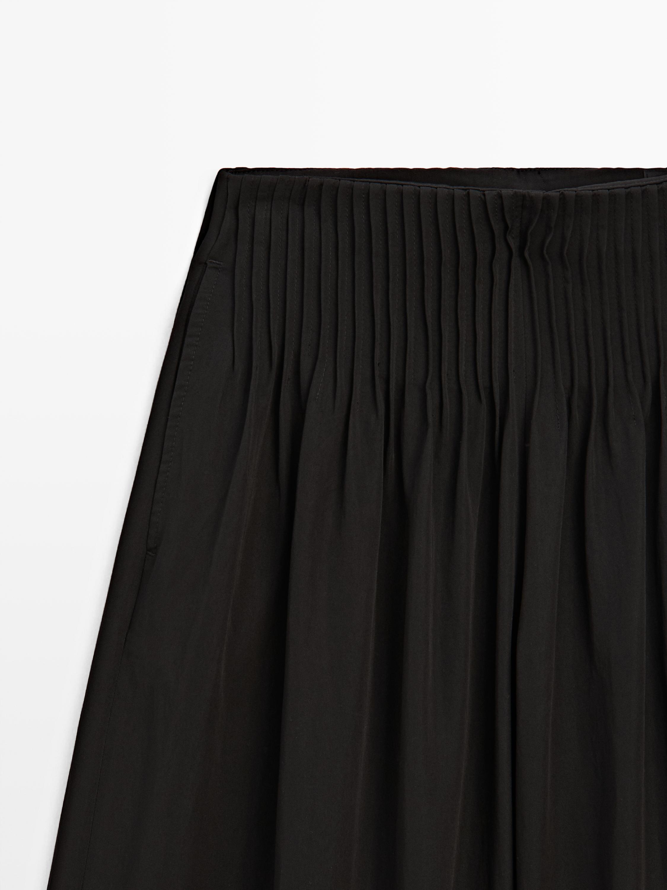 Flowing wide-leg pants — BLACK