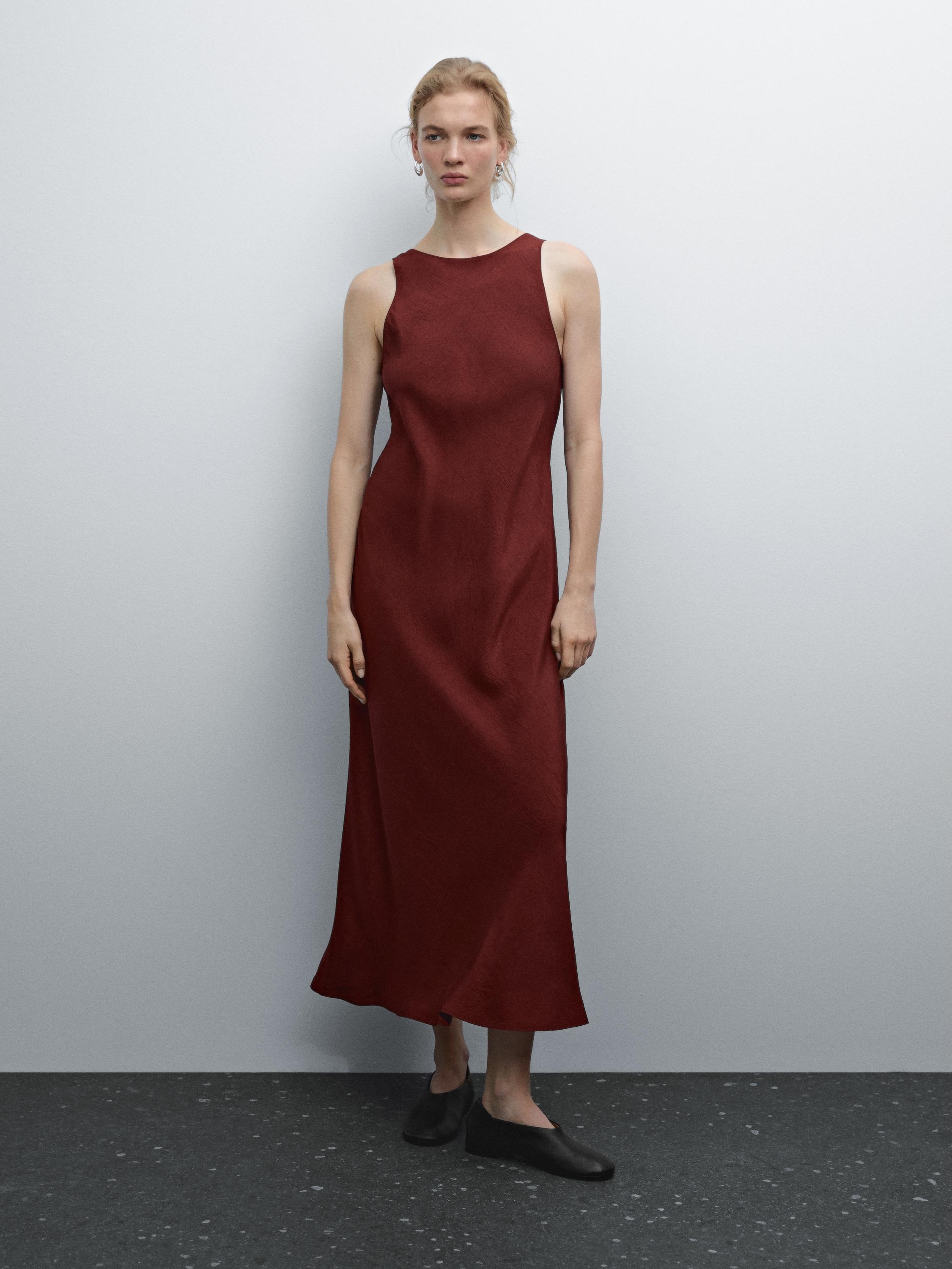 Robe Massimo Dutti noire, Taille 42, élégante et fluide (D'occasion) à Robe Massimo Dutti noire, Taille 42, élégante et fluide (D'occasion) à