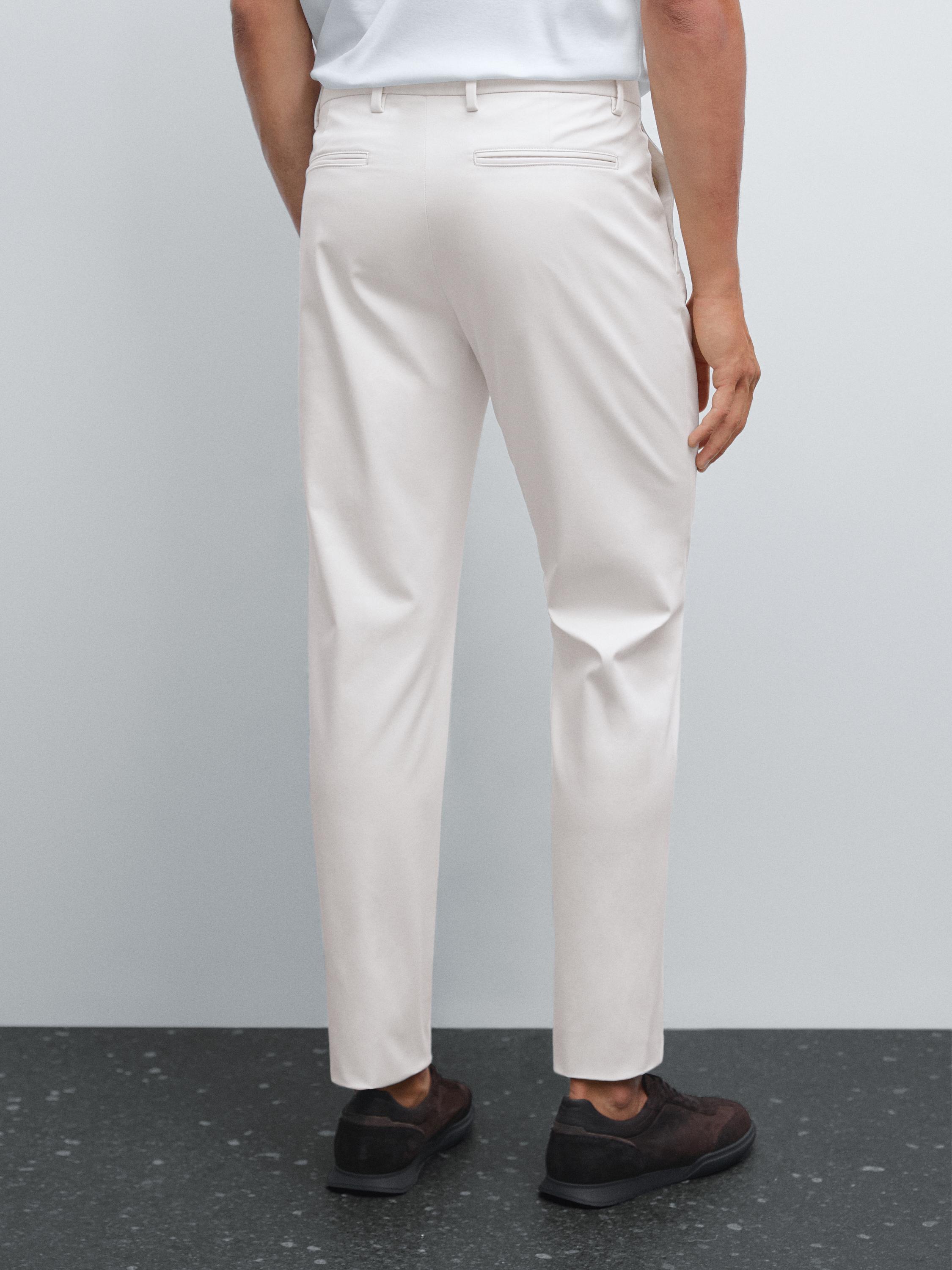 Slim fit панталони од мешавина со памук