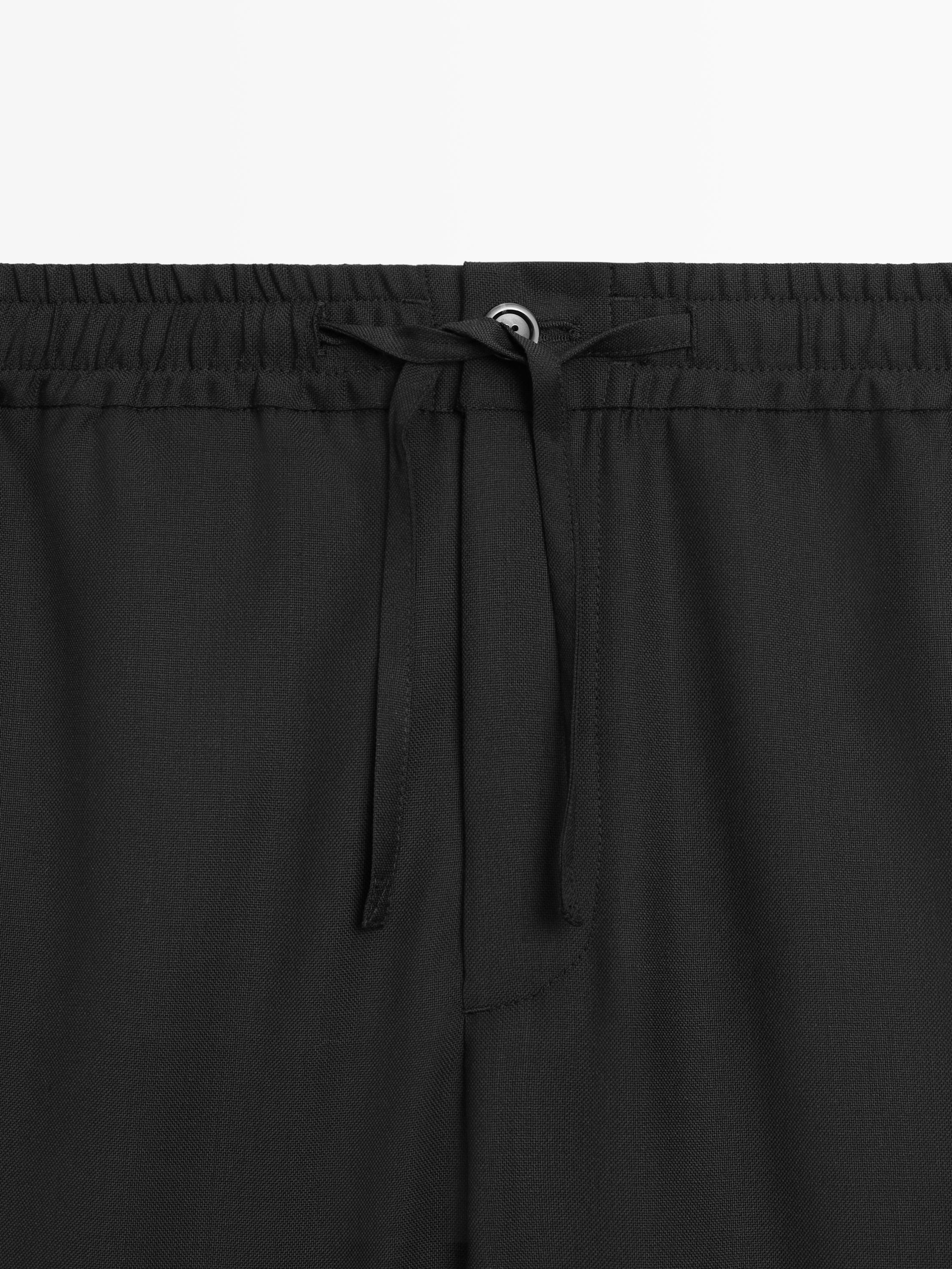Relaxed fit 100% wool trousers — BLACK