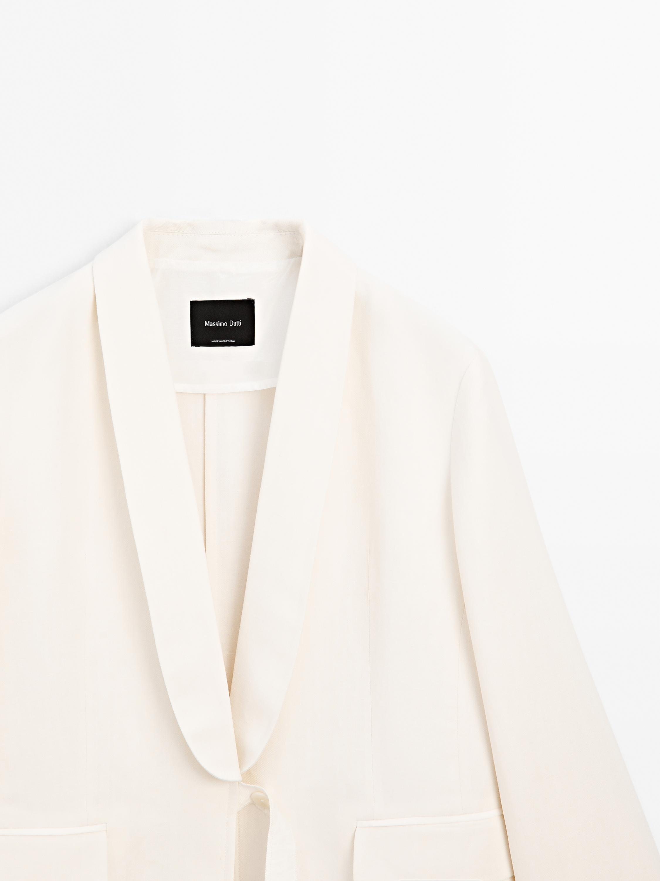 Suit blazer with tie detail in contrast fabric