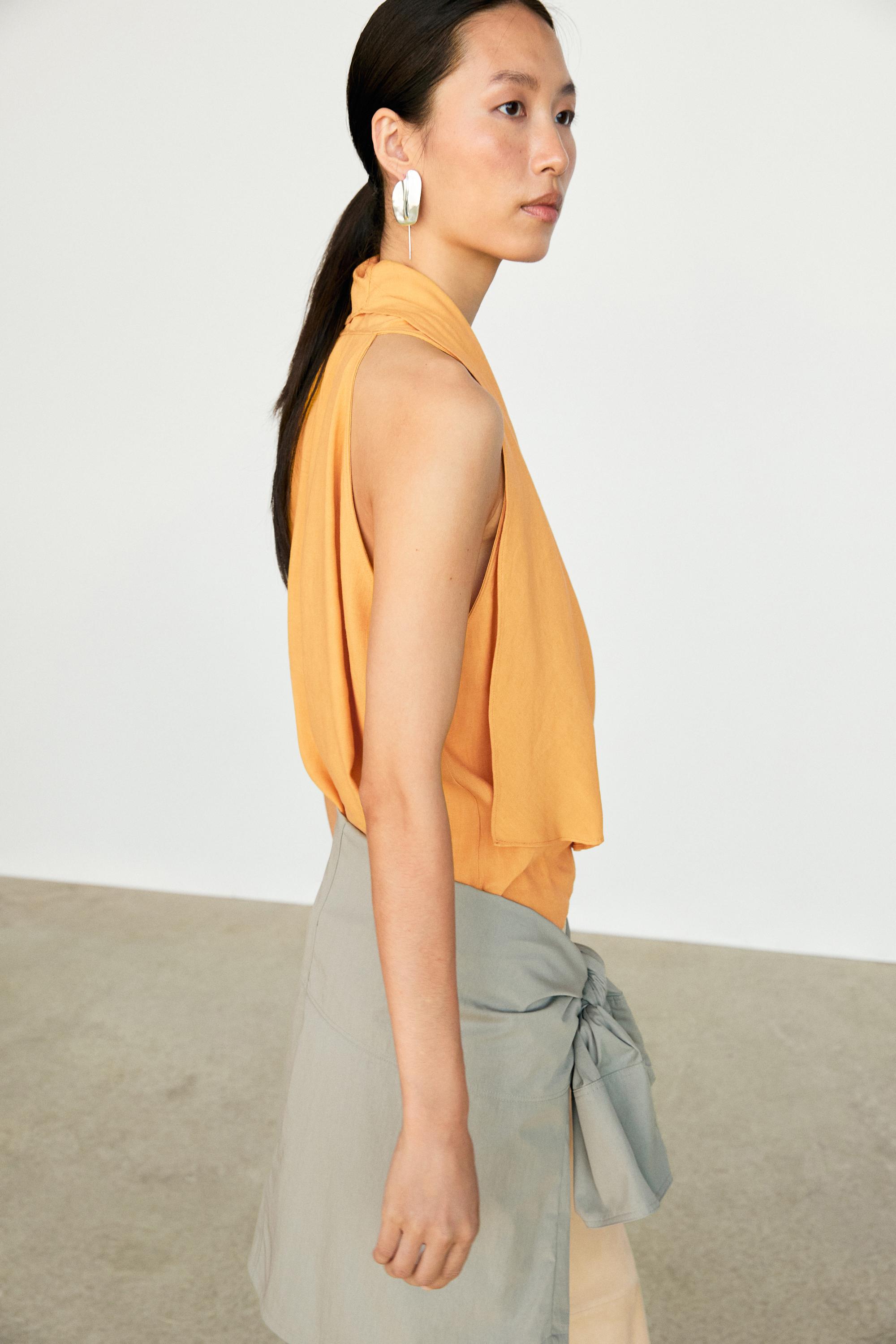 Flowing halter top with ruffle detail — YELLOW