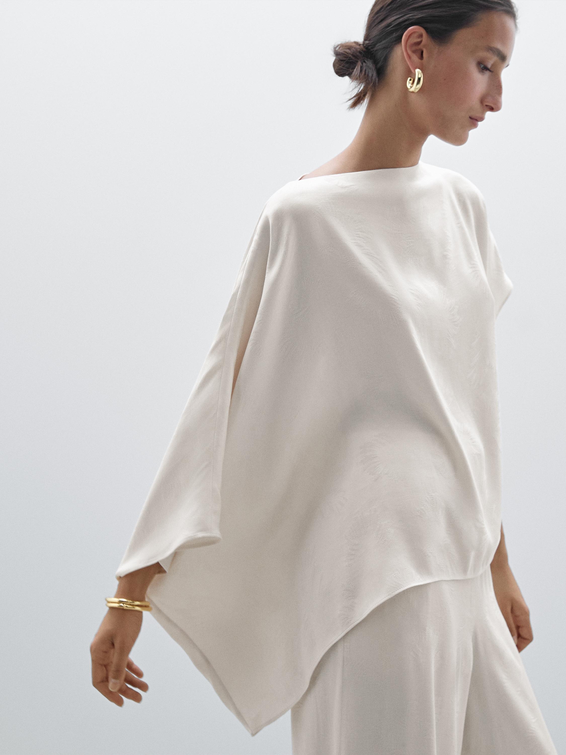 Flowing cape sleeve top
