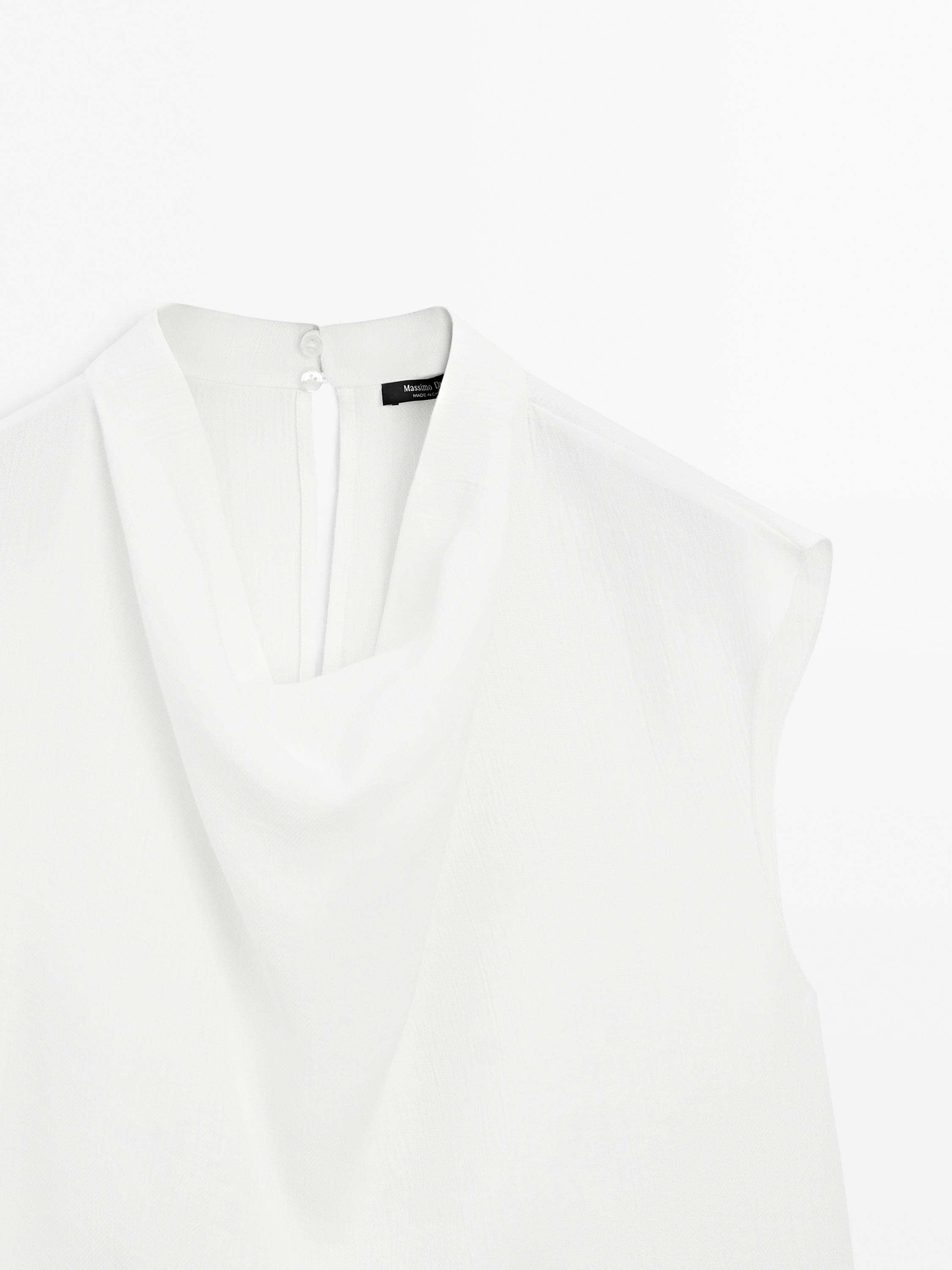 Flowing blouse with draped collar
