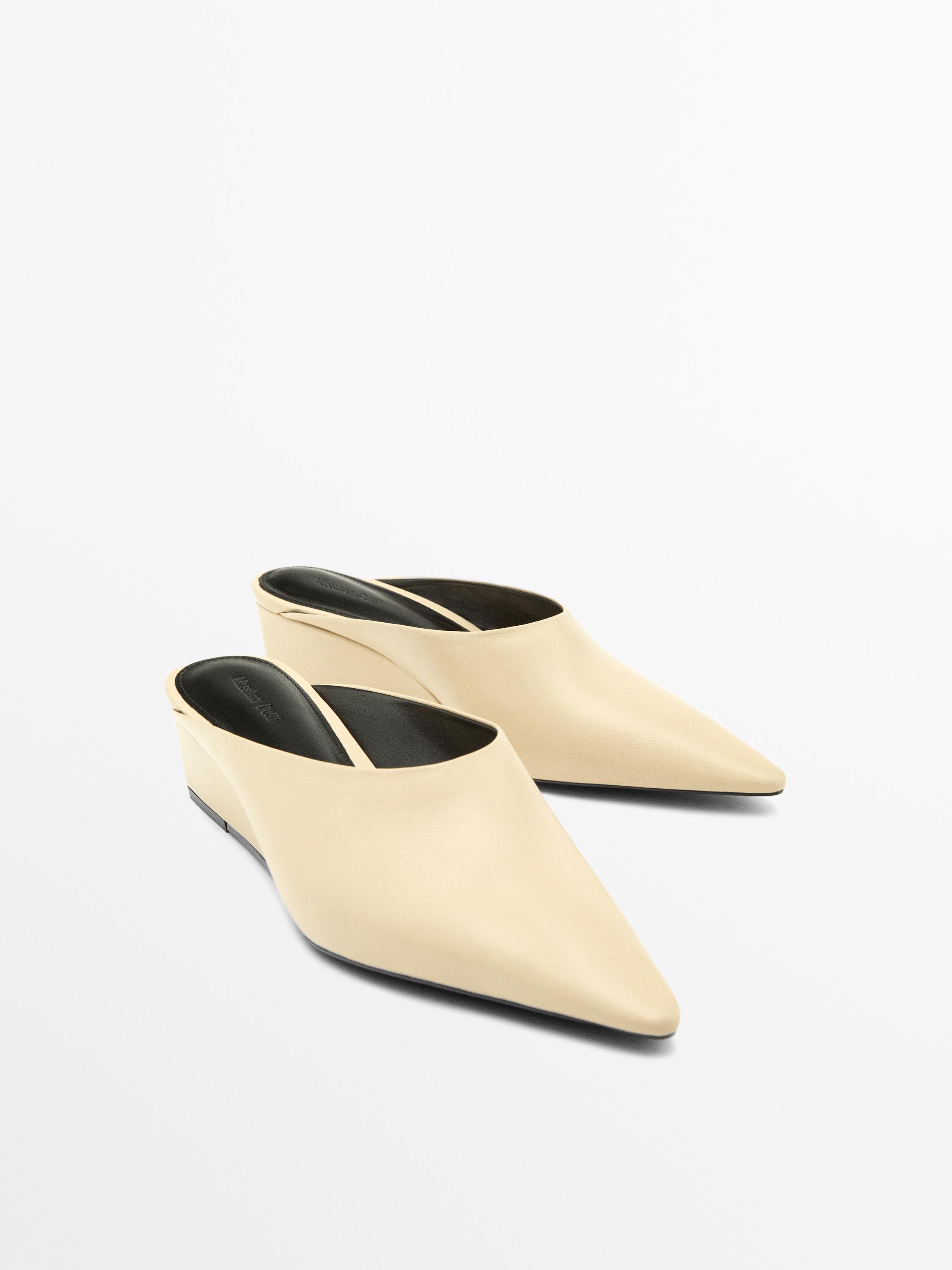 Mules com salto de cunha