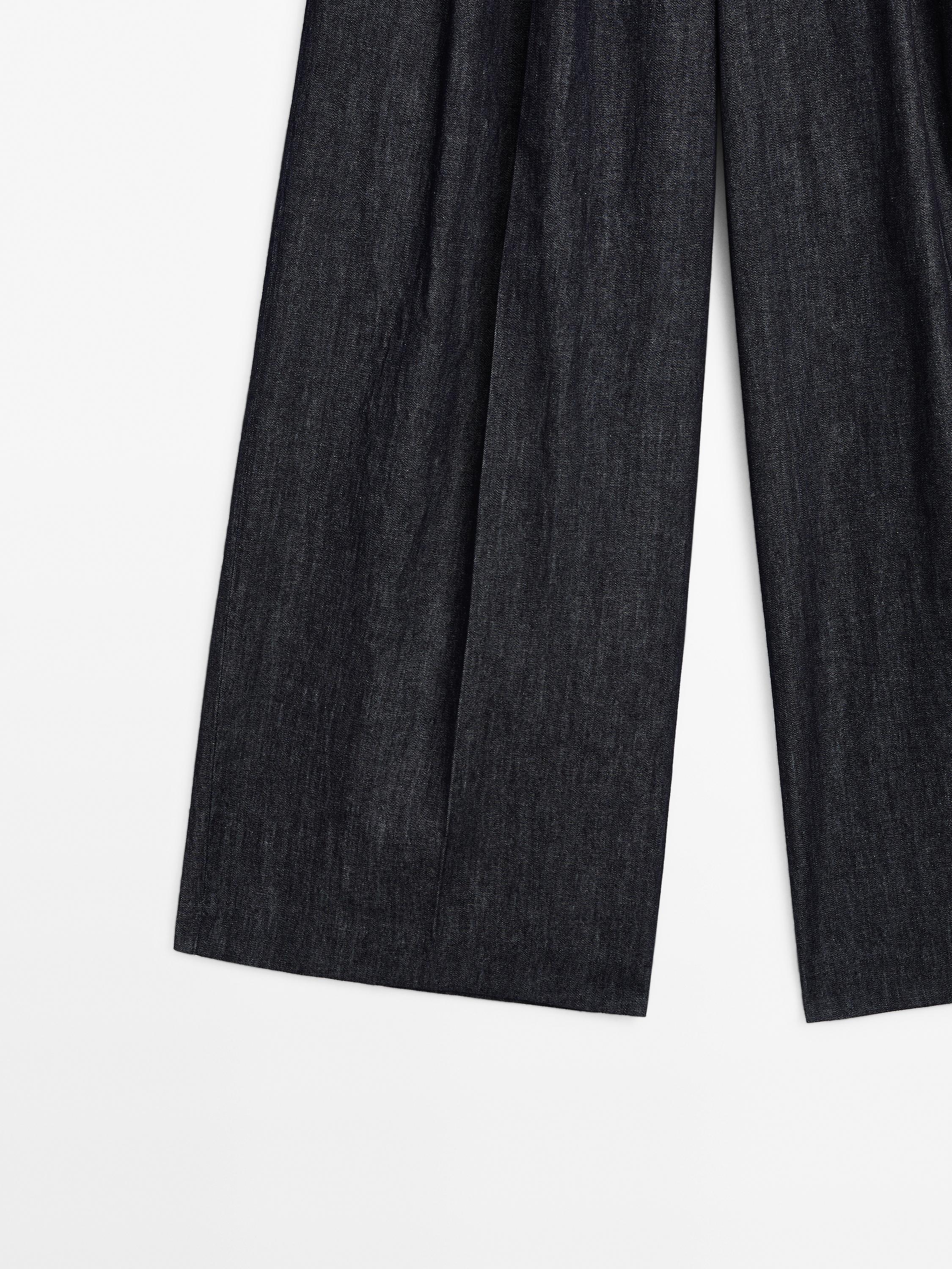 Lekkie jeansy z szerokimi nogawkami i wysokim stanem