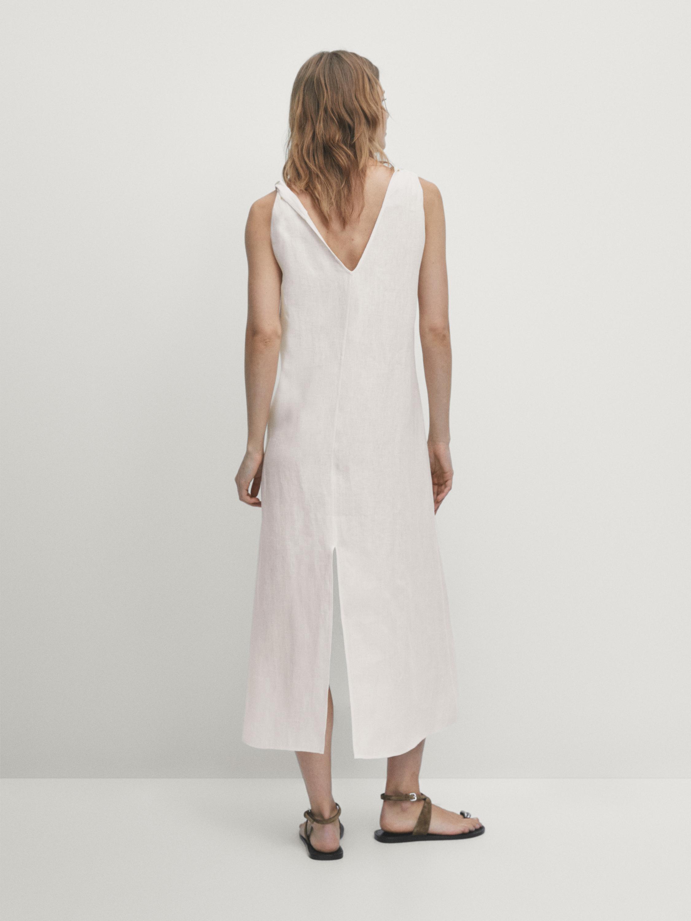 Linen midi dress with strap details