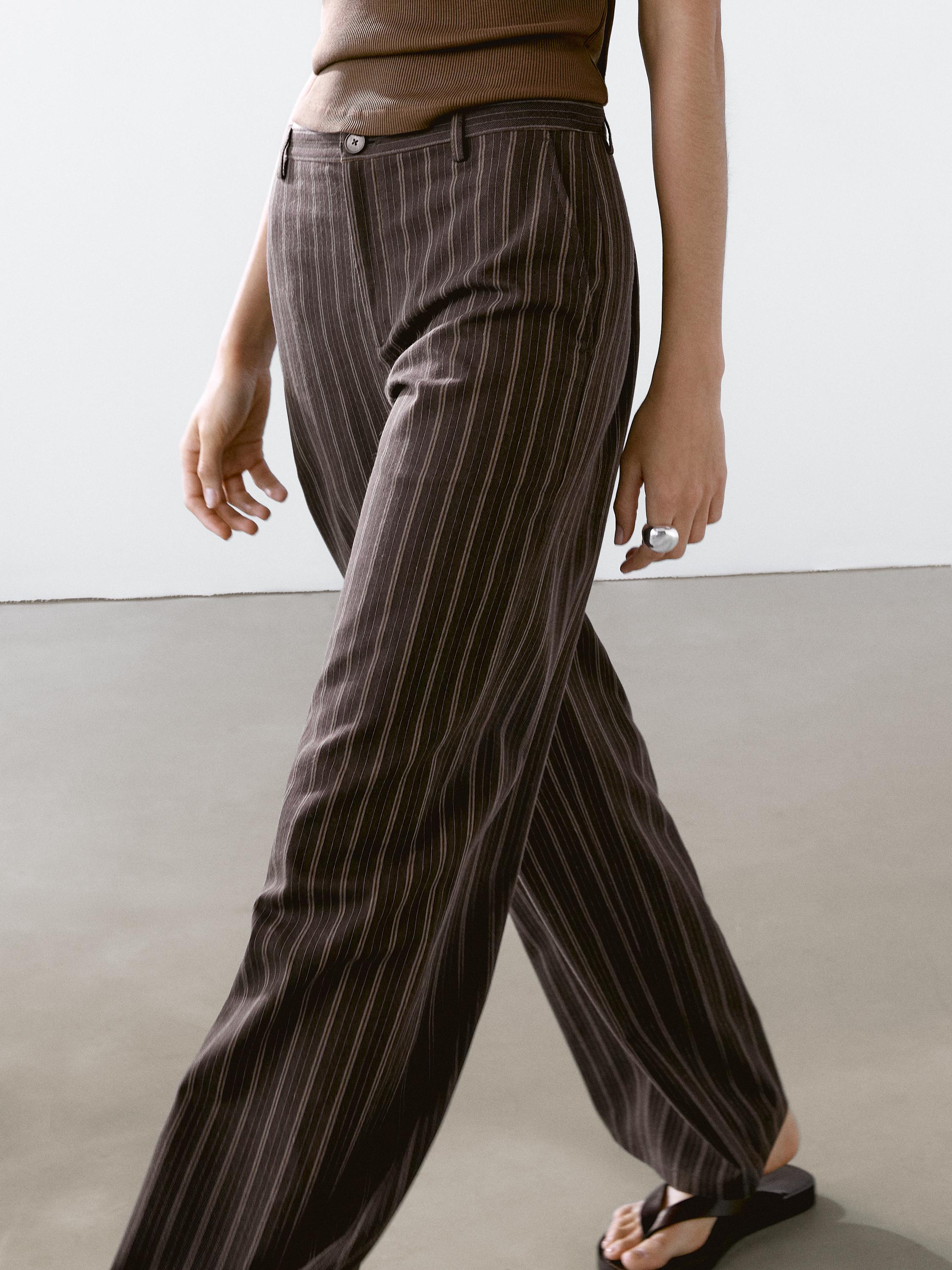 Low-rise wide-leg striped trousers
