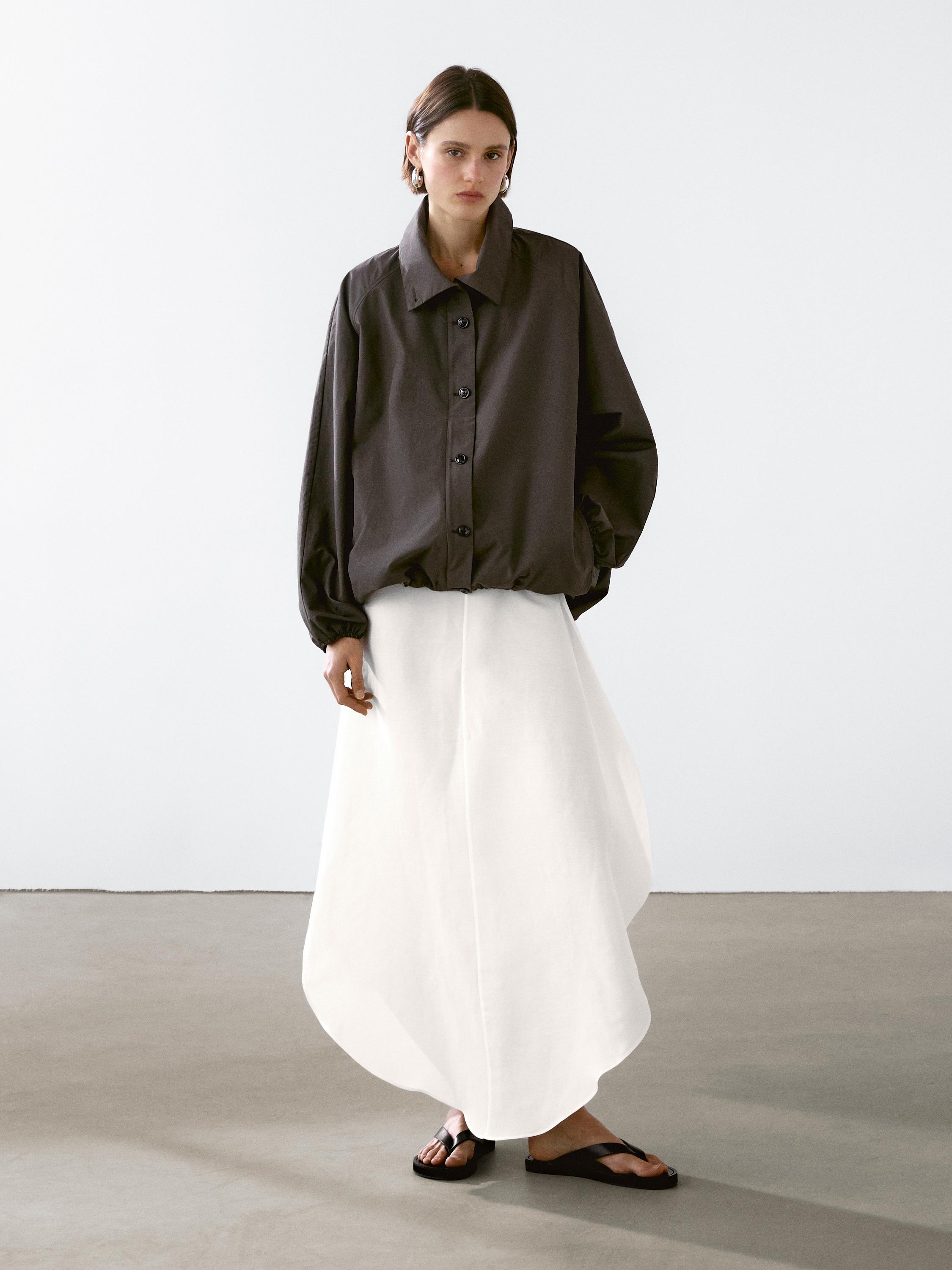 Parka detalle abullonado con algodón