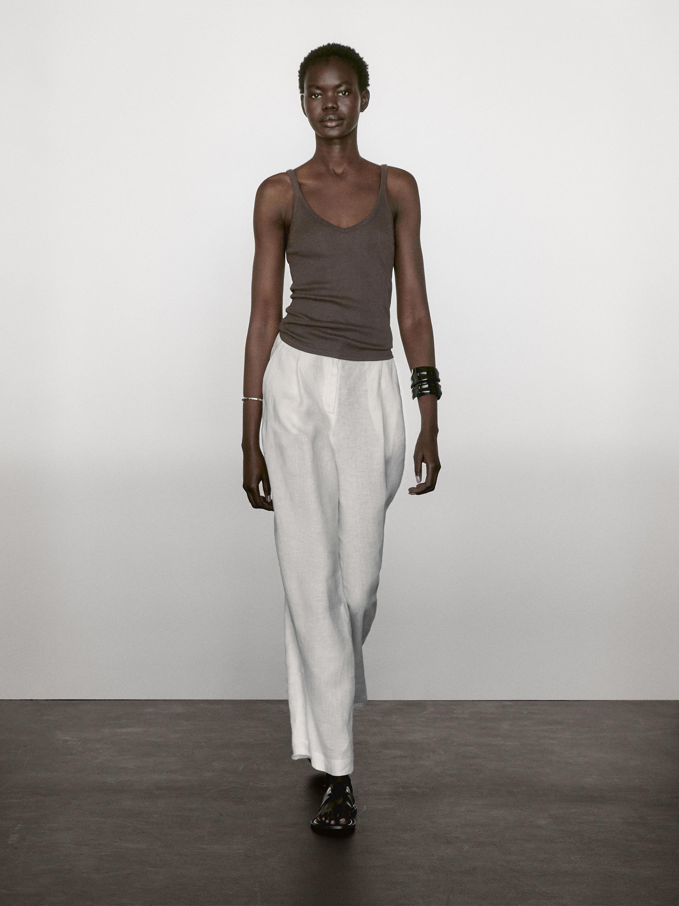 Top con scollo a v in tessuto a coste