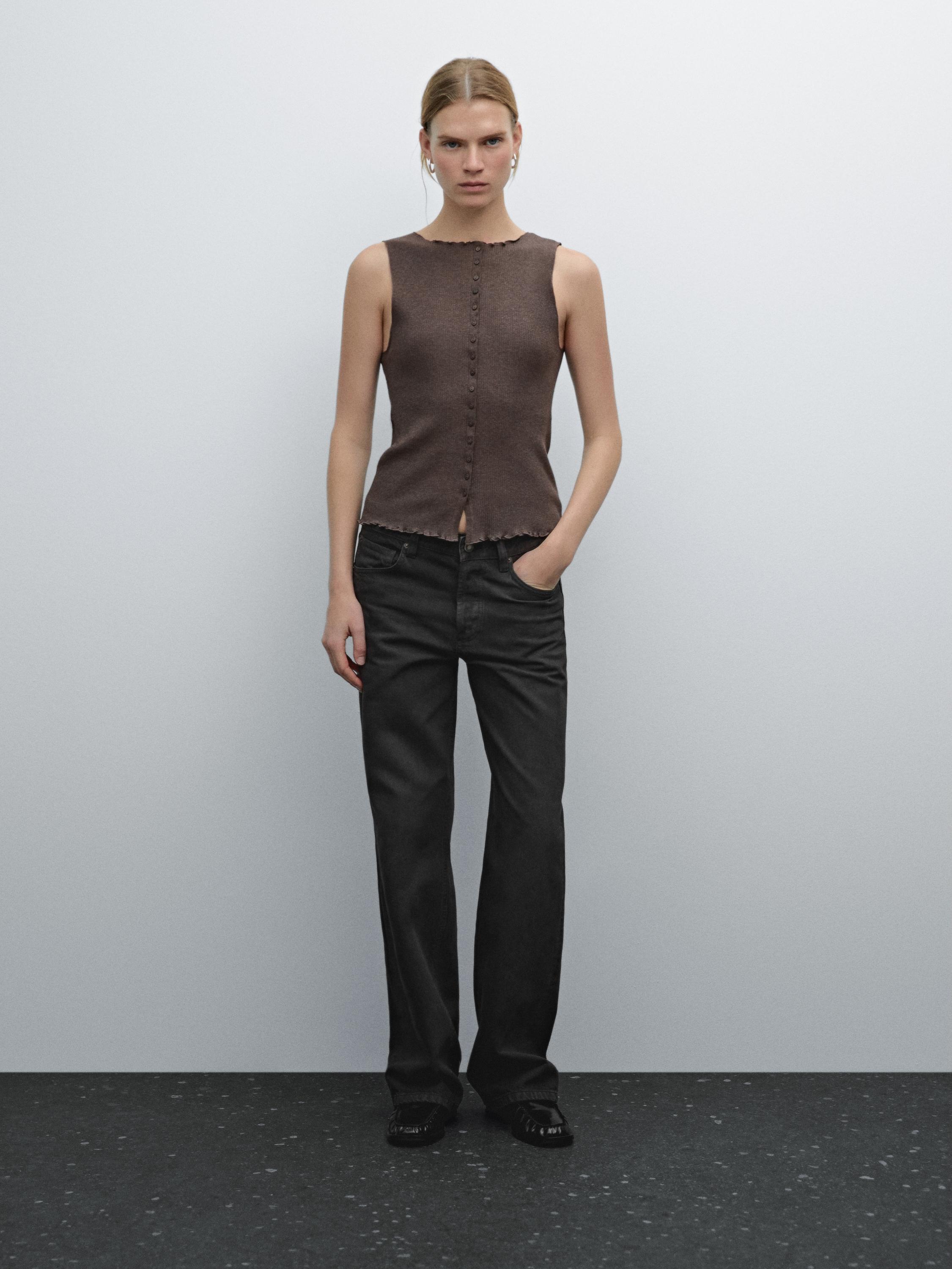 Knit waistcoat top with buttoned strap