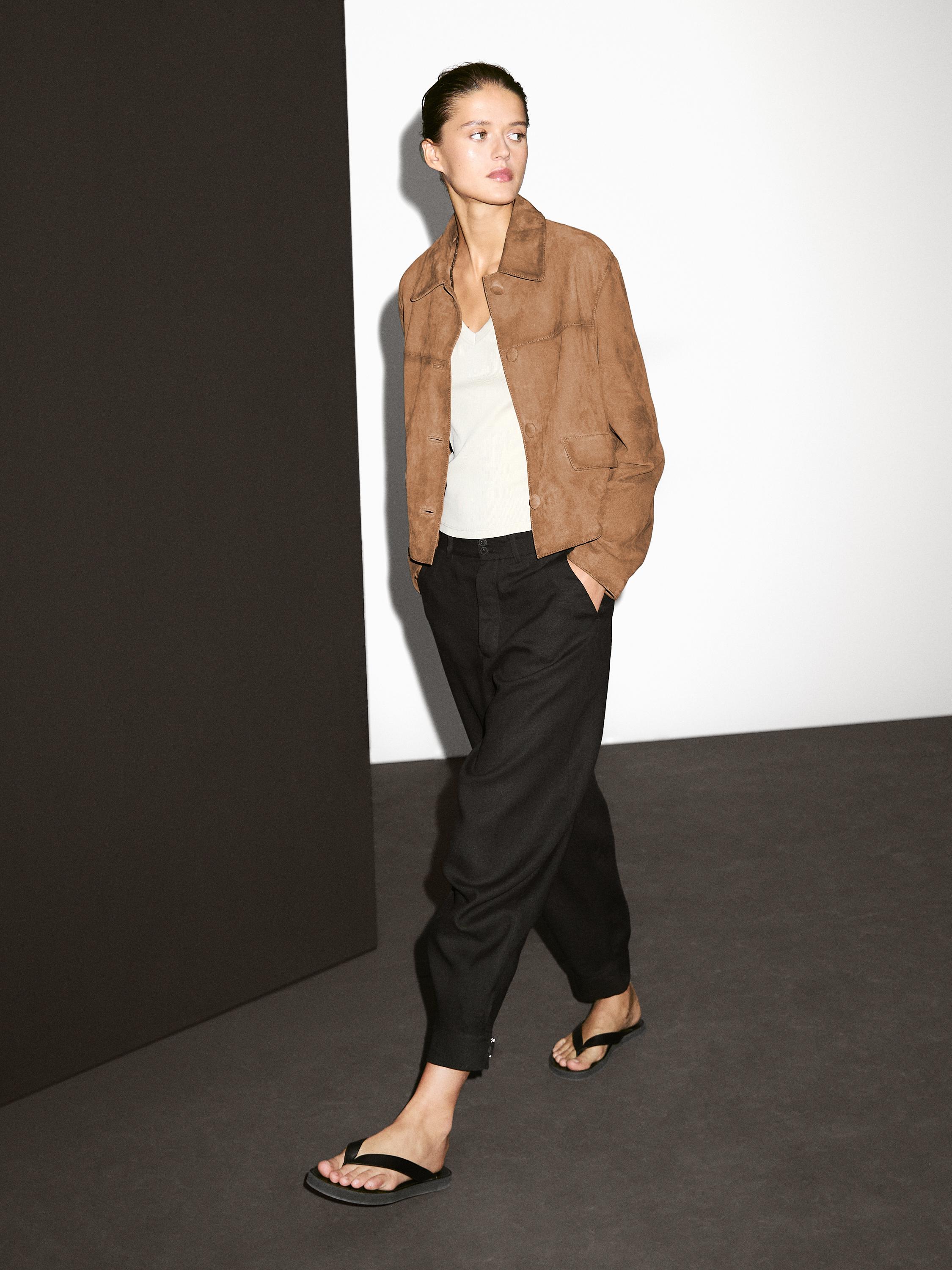 Blouson en cuir finition daim avec boutons doublés