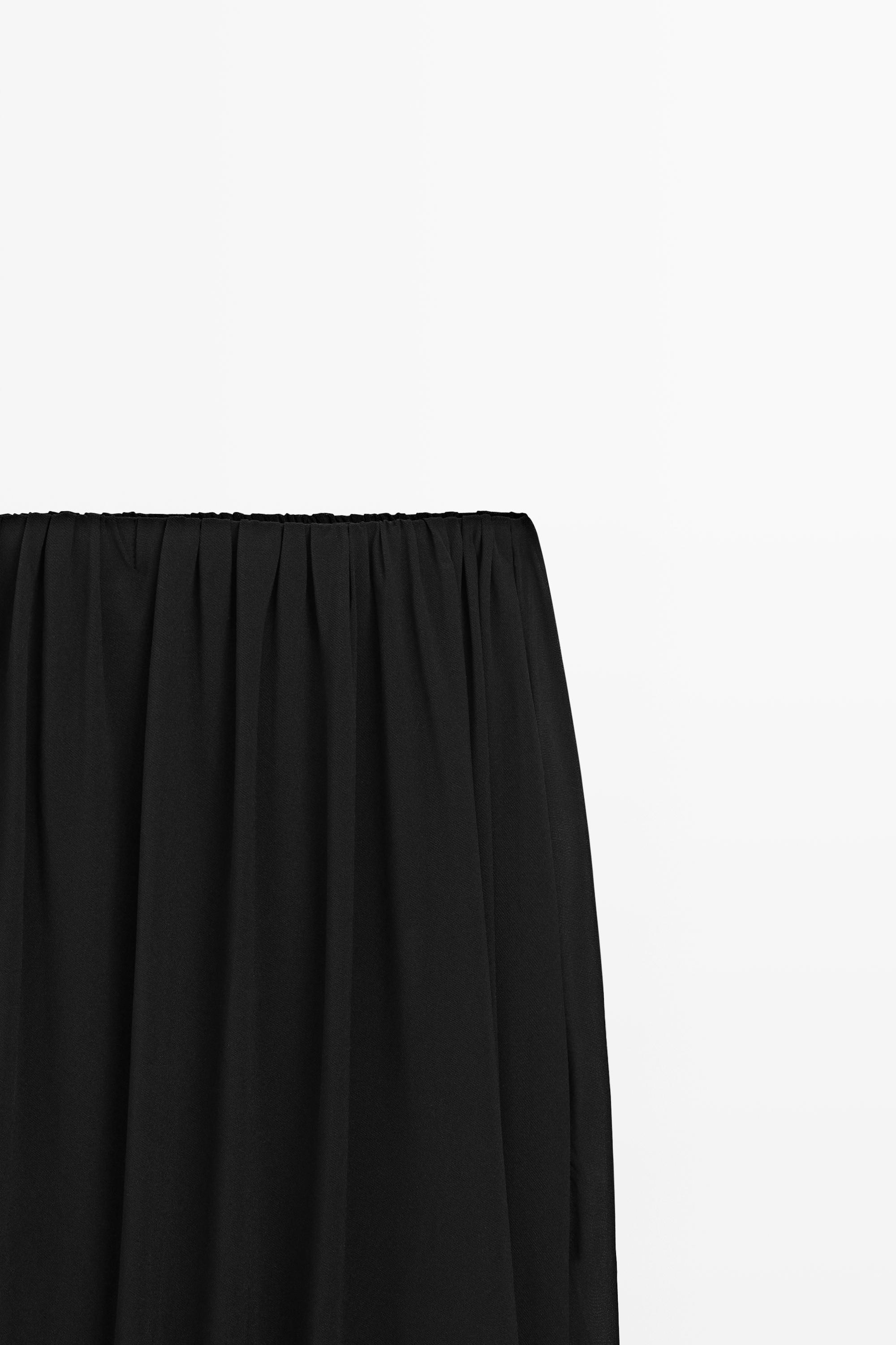Strapless pleated flowing top