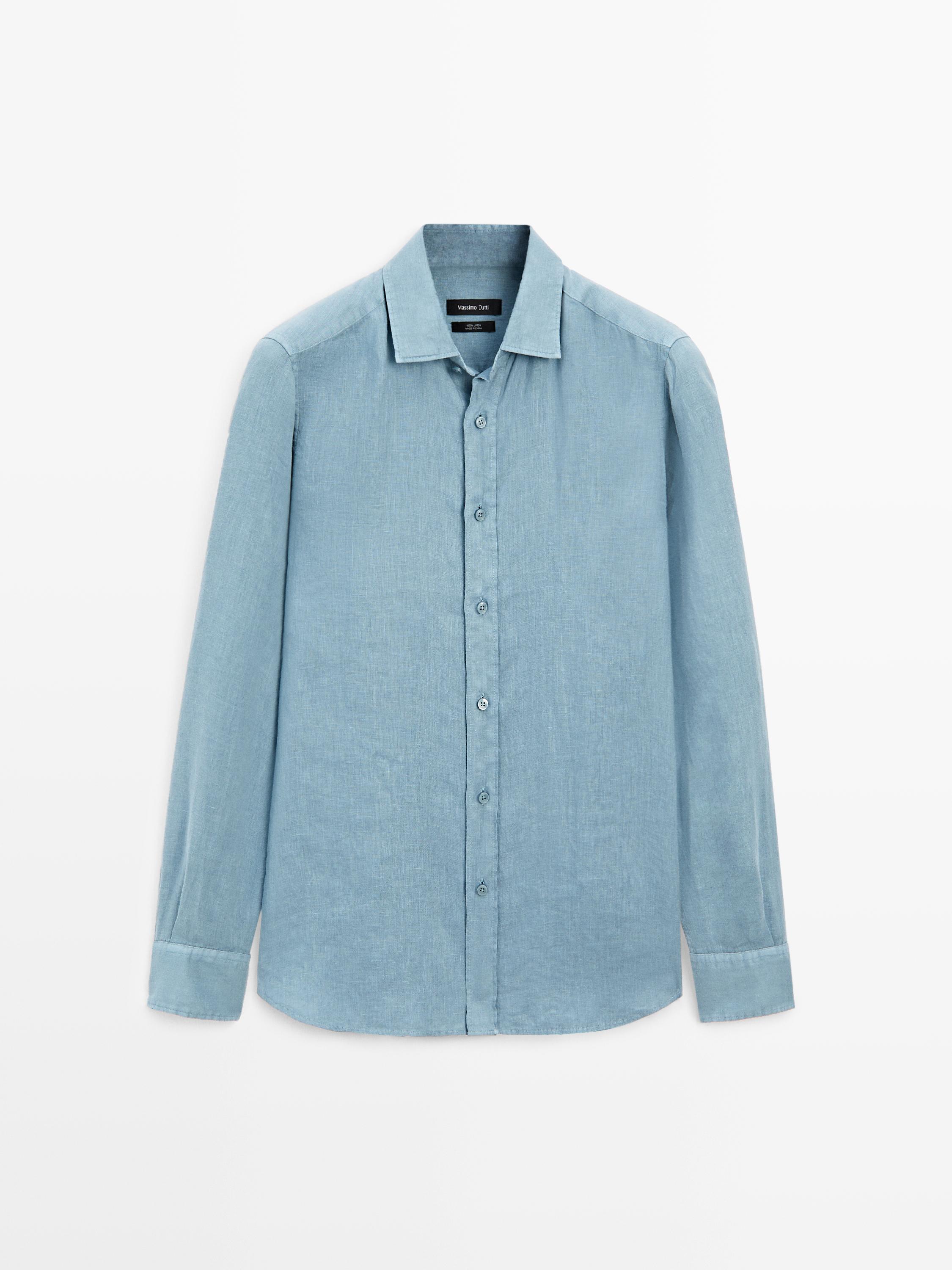 Front view of a green slim fit shirt with a classic collar and central button placket. Long sleeves with cuffs.