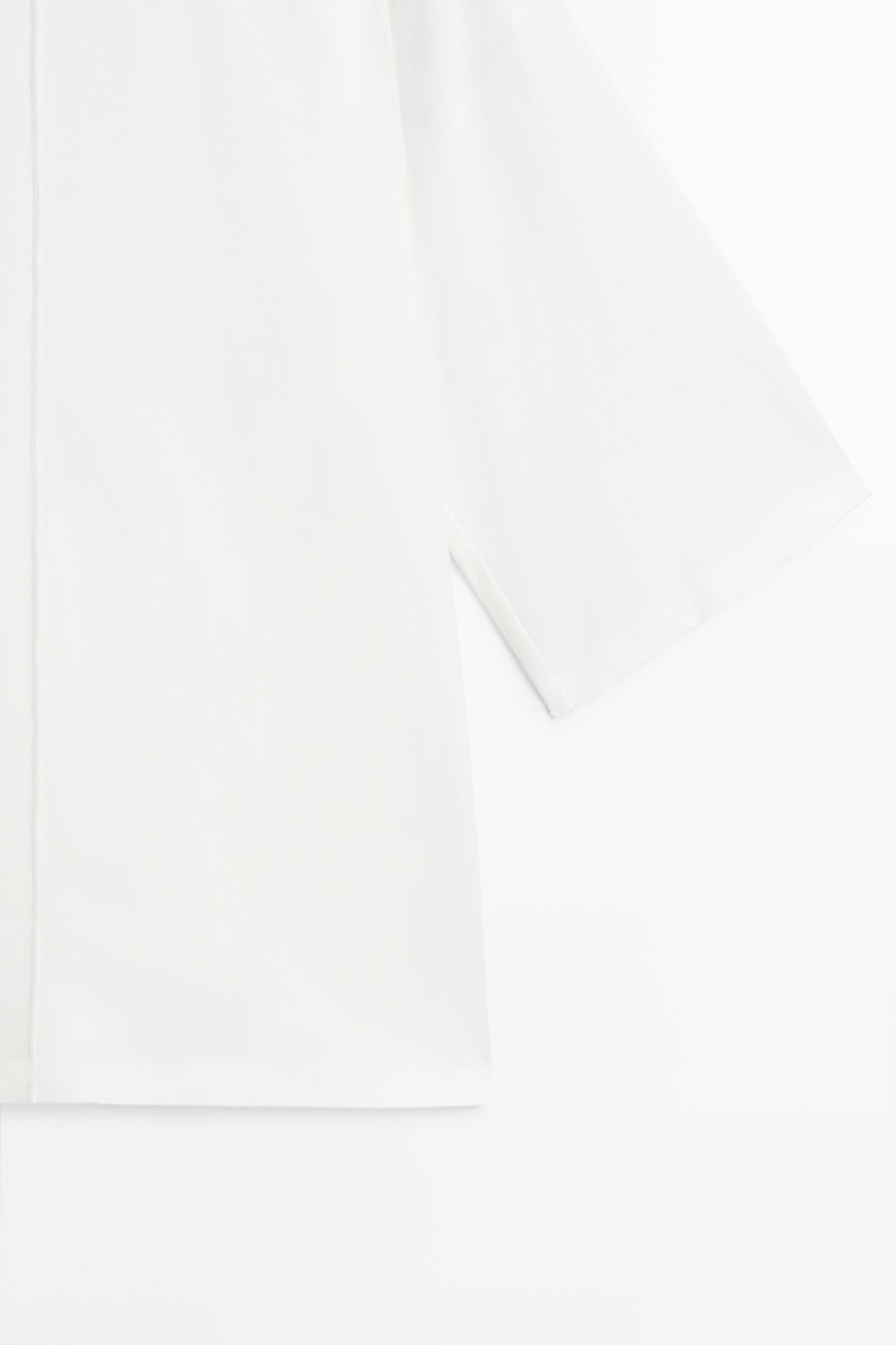 100% cotton short sleeve seamed T-shirt — Off white