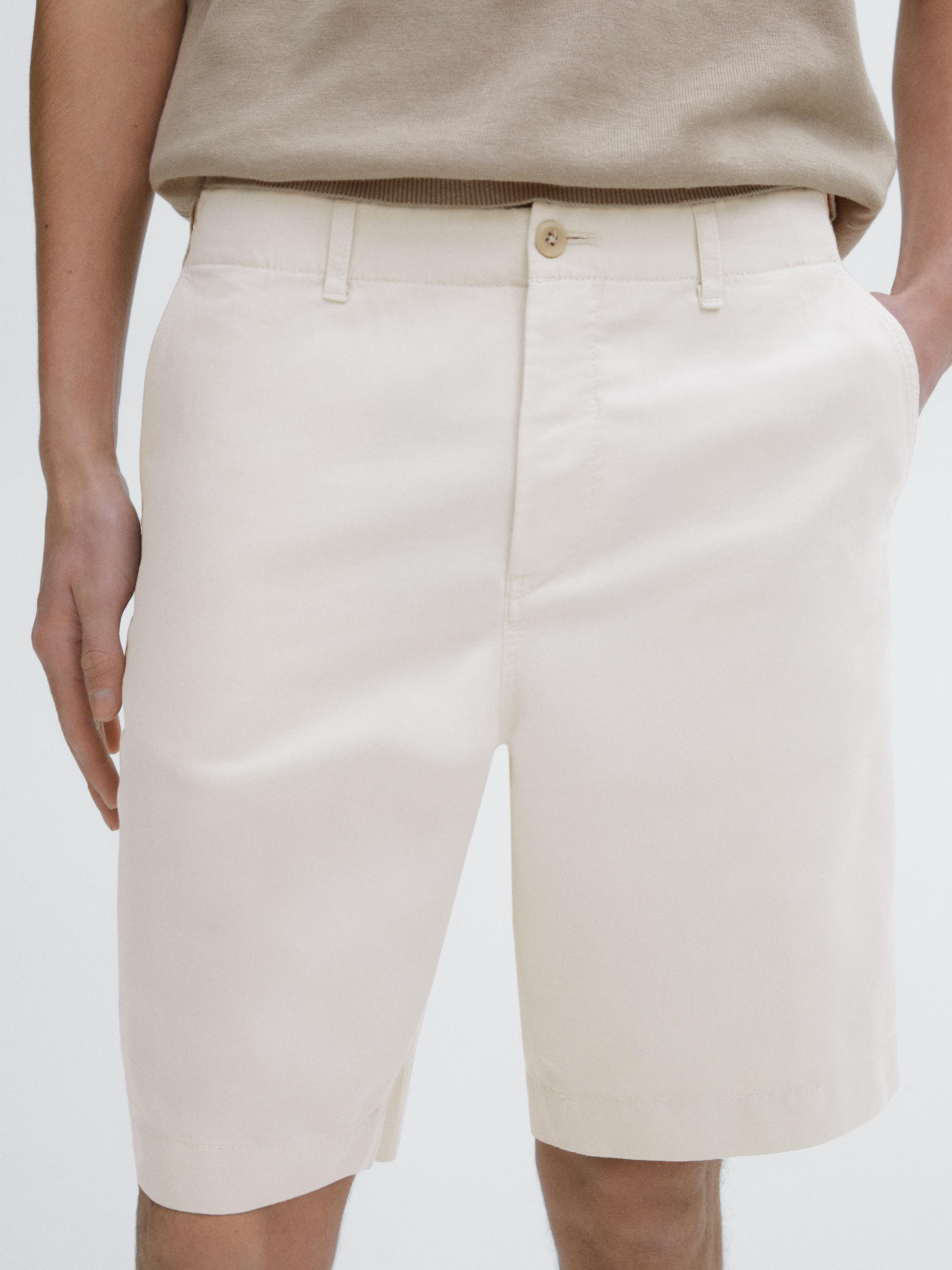 100% linen Bermuda shorts with side elastic detail