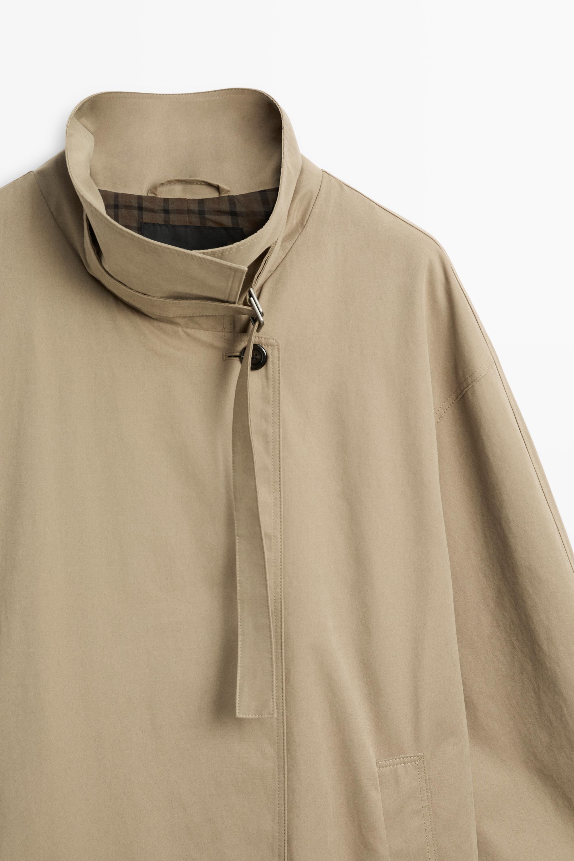 Long trench coat with buckle detail — Beige