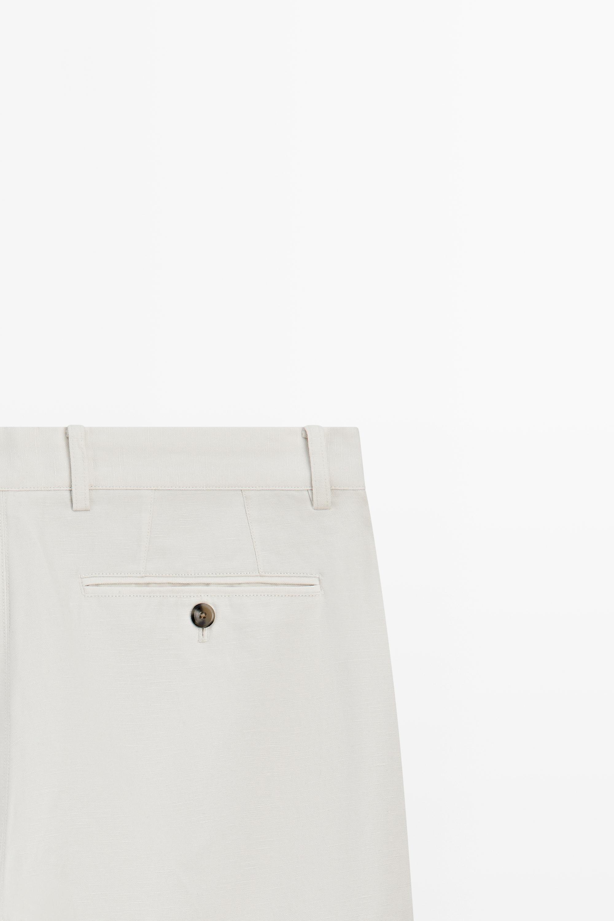 Cotton and linen tapered fit trousers — Off white