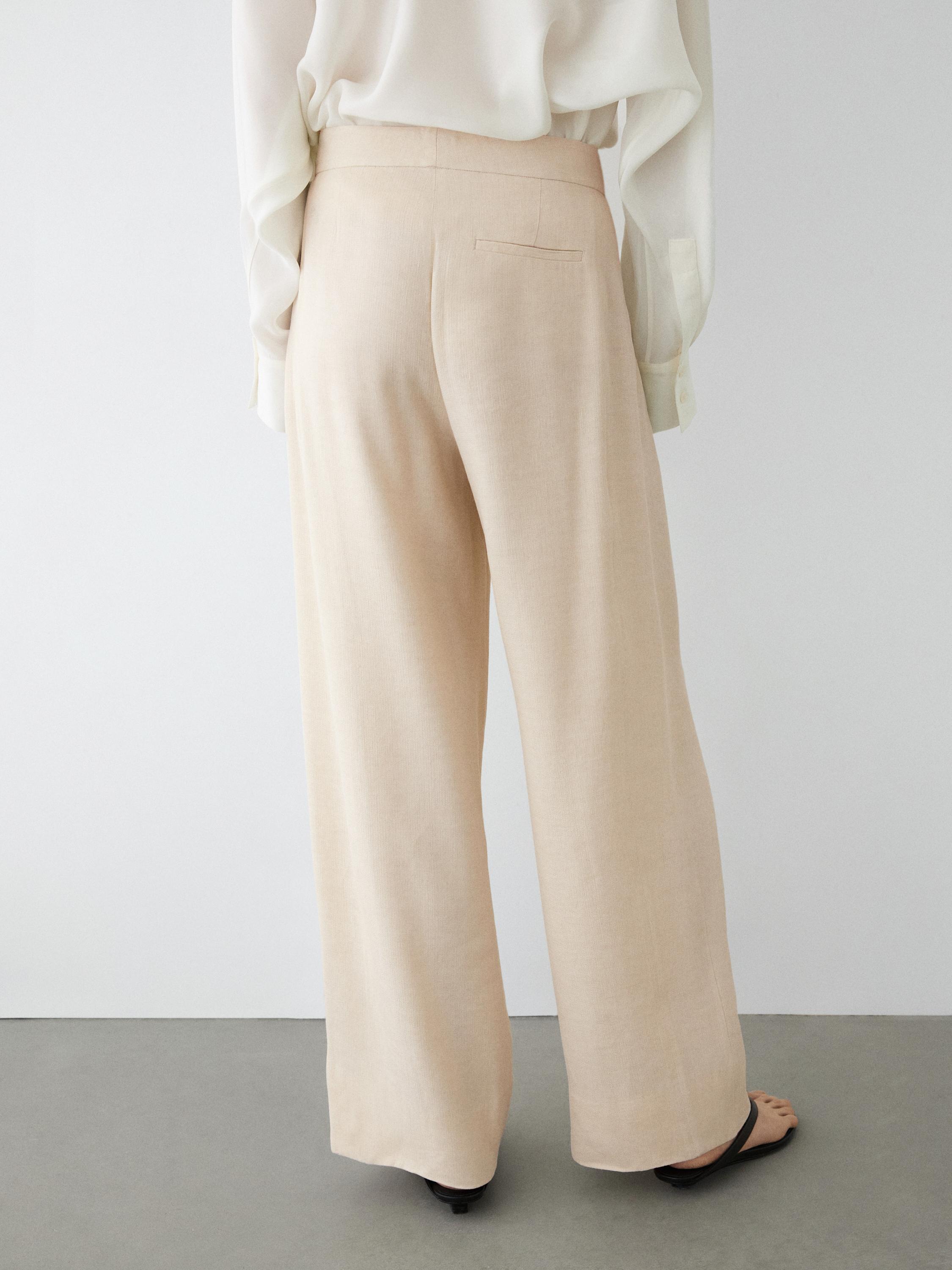Linen blend suit trousers with button detail — CREAM