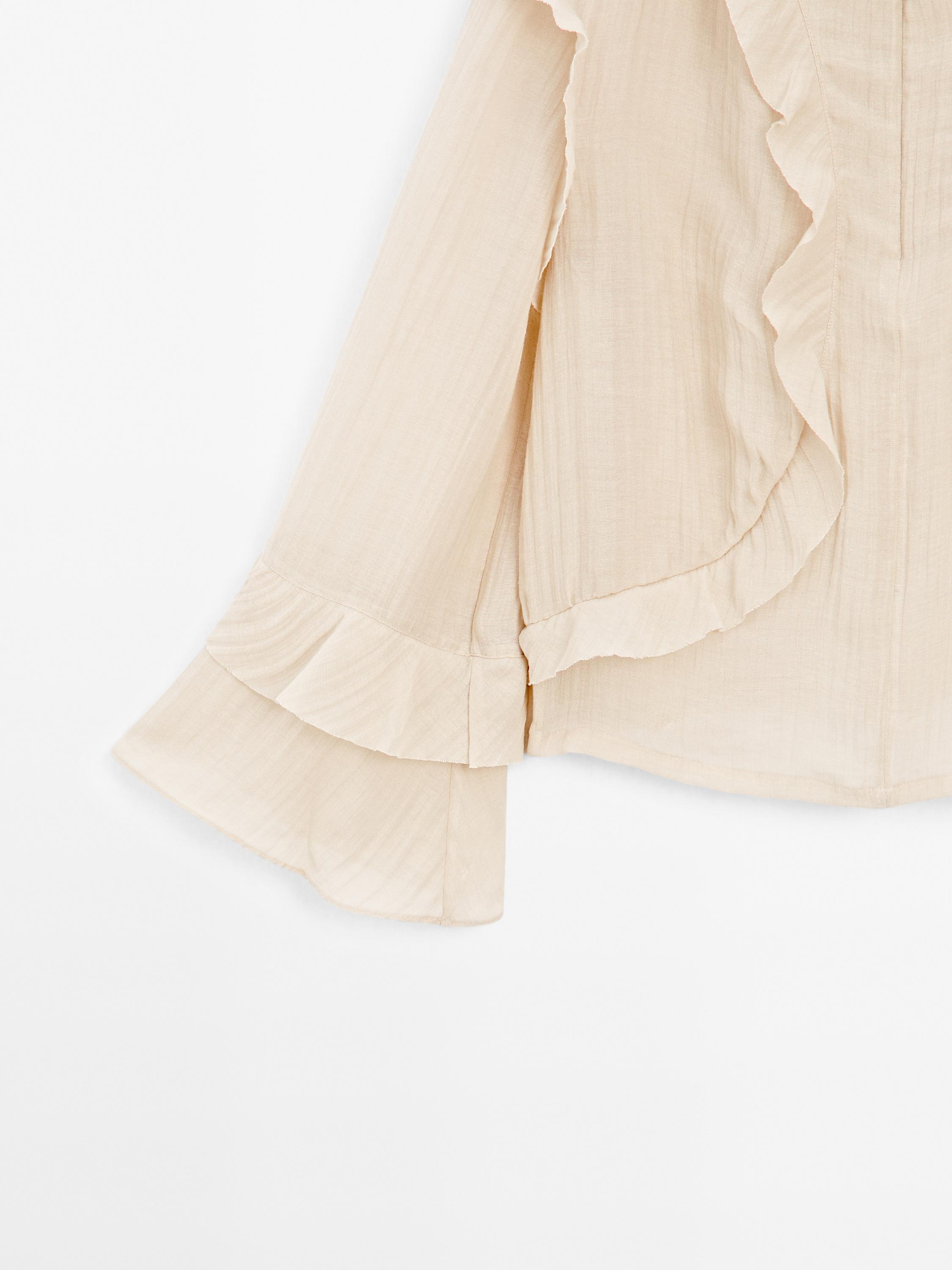 Flowing blouse with ruffles