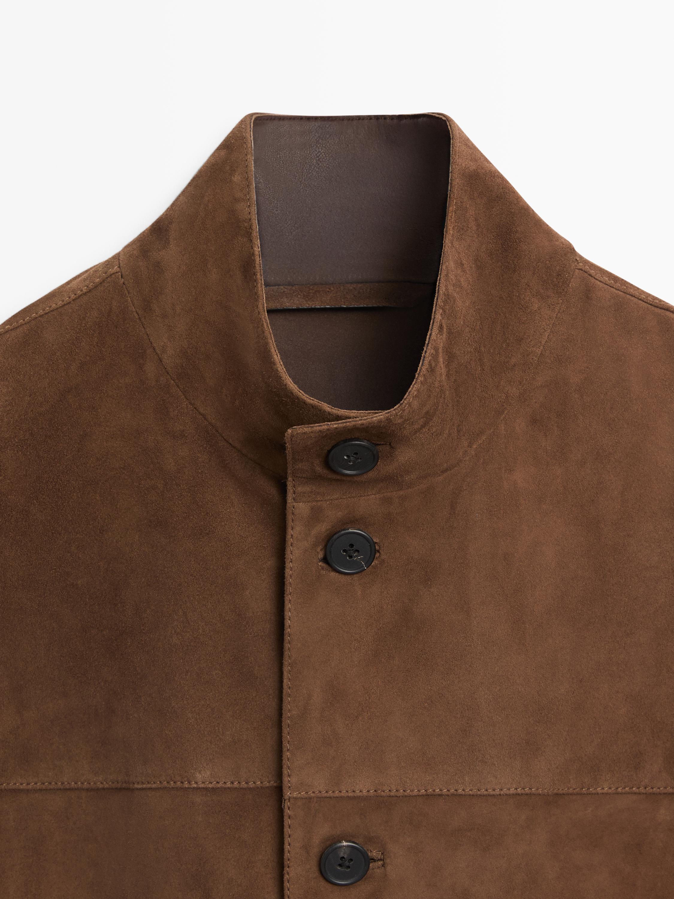 "Tobacco bomber jacket with a high neck and black front buttons."