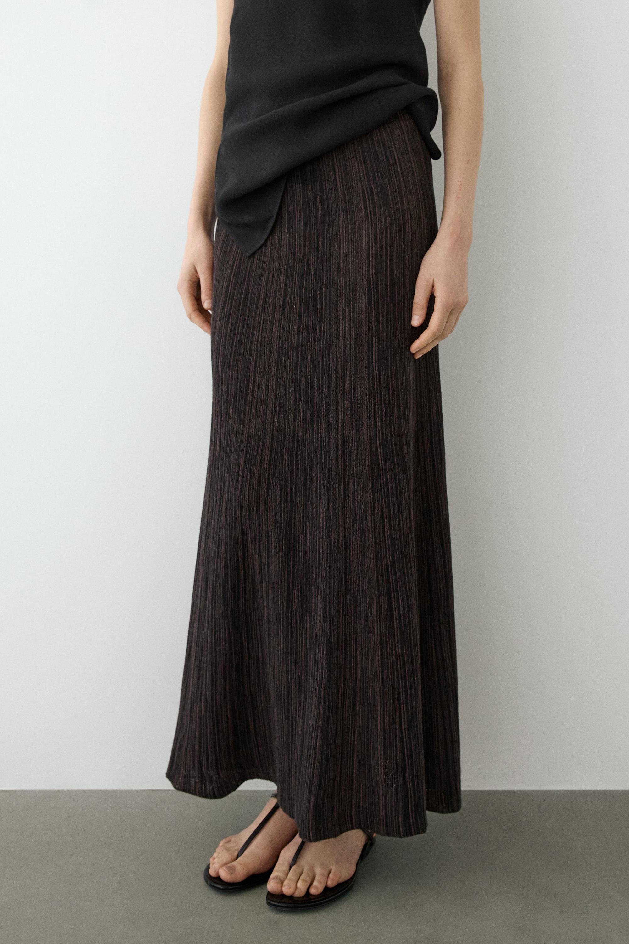 Jupe midi plissée total look à rayures