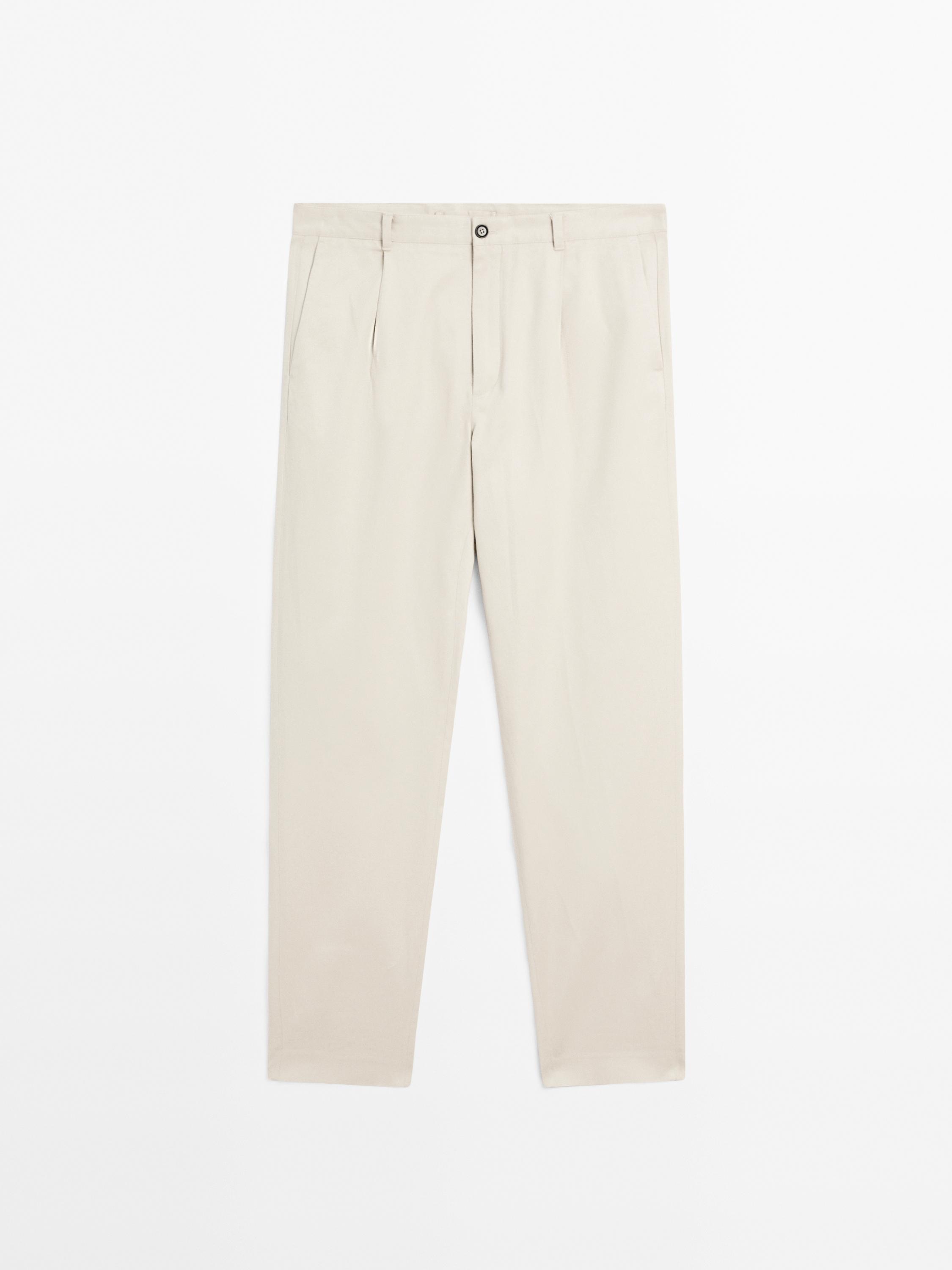 Pantalón straight fit detalle pinza