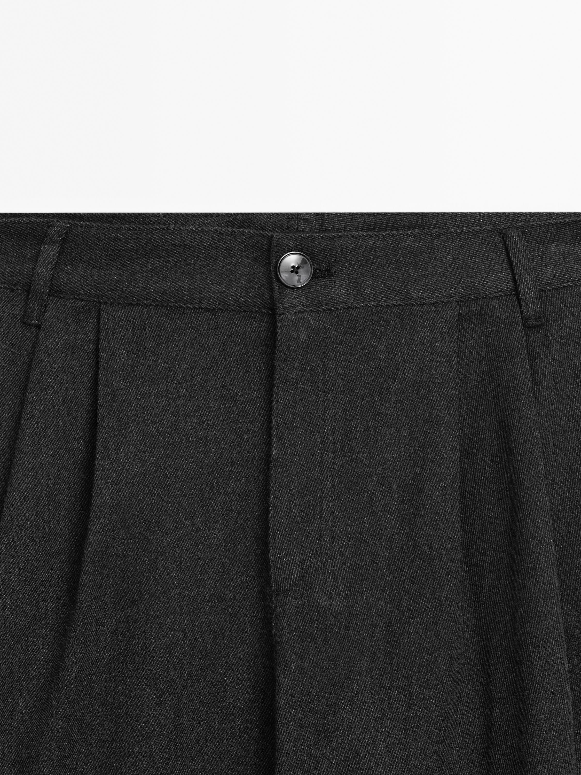 Flowing pleated cotton blend trousers