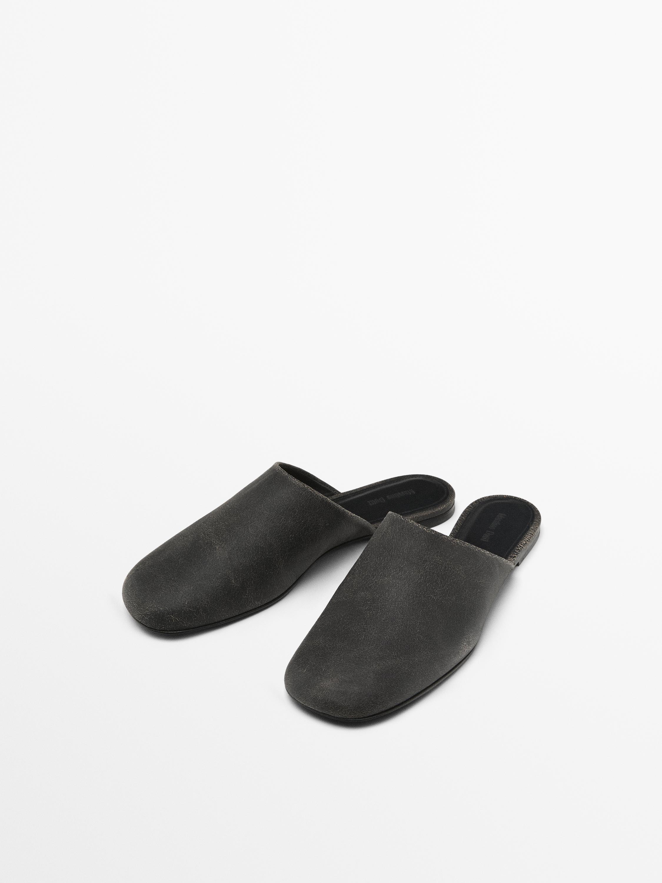 Oiled leather mules