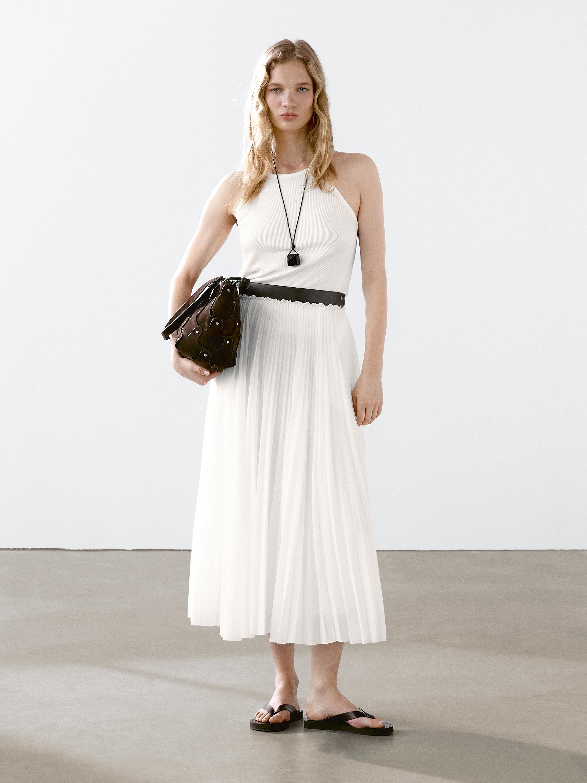 Jupe plissée avec détail en cuir