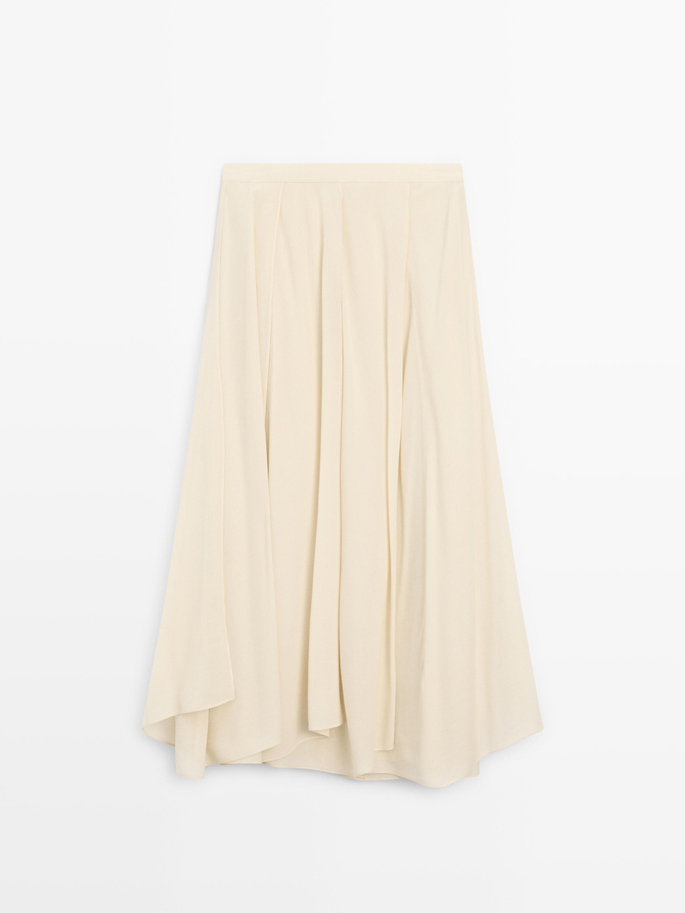 Falda midi fluida detalle volantes