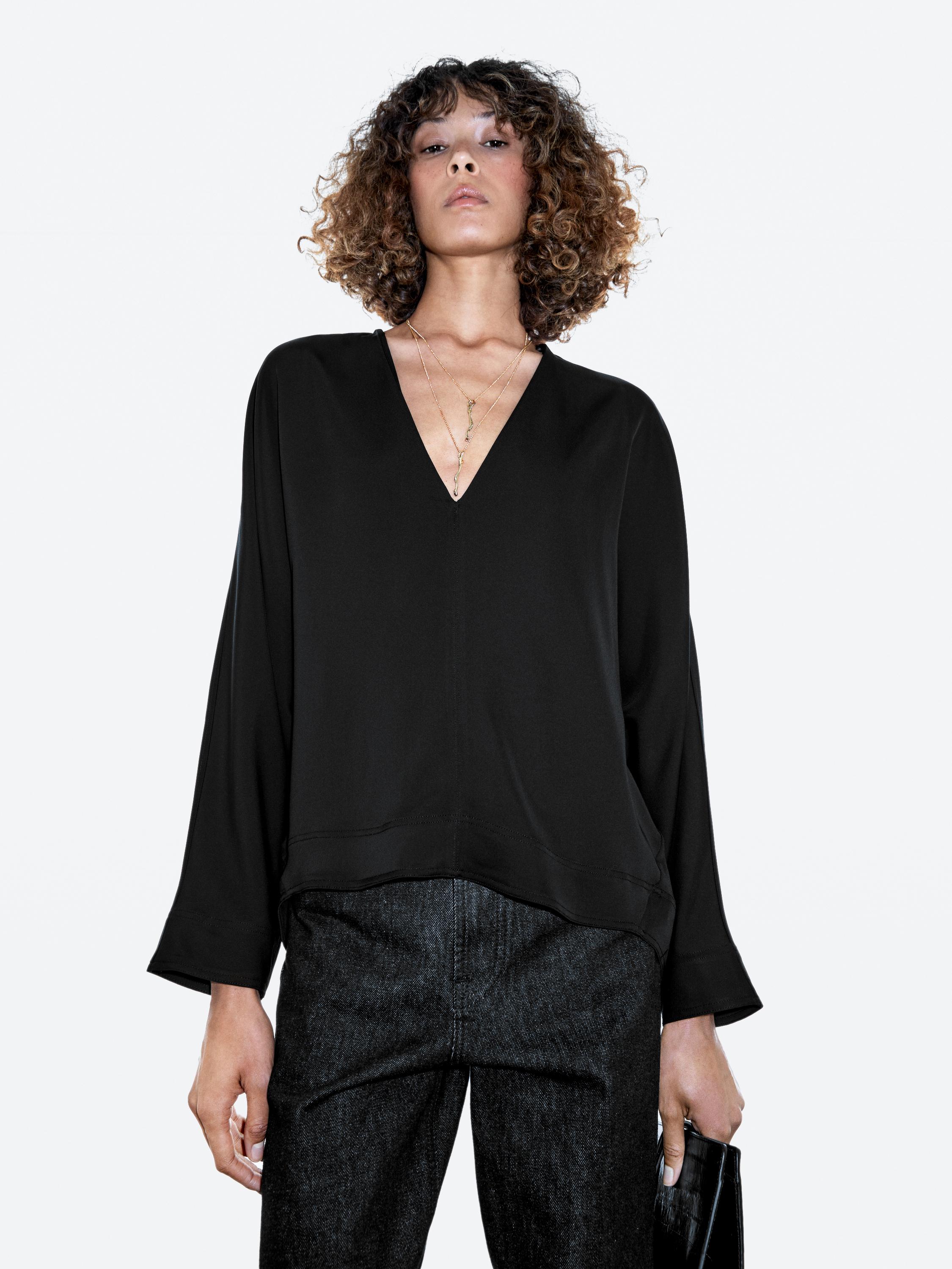Flowing blouse with V-neckline